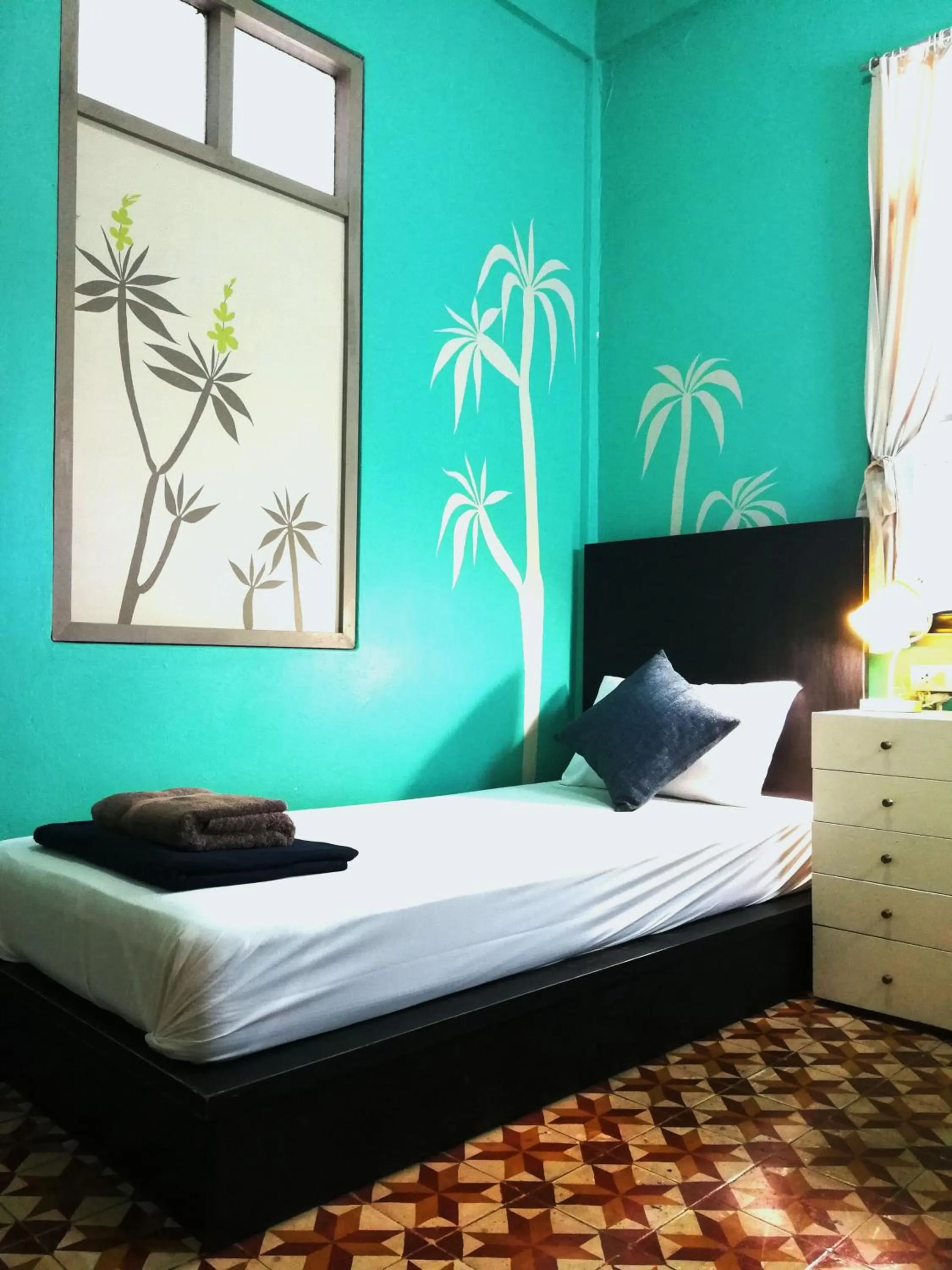 Bedroom, Bed in 60 Blue House