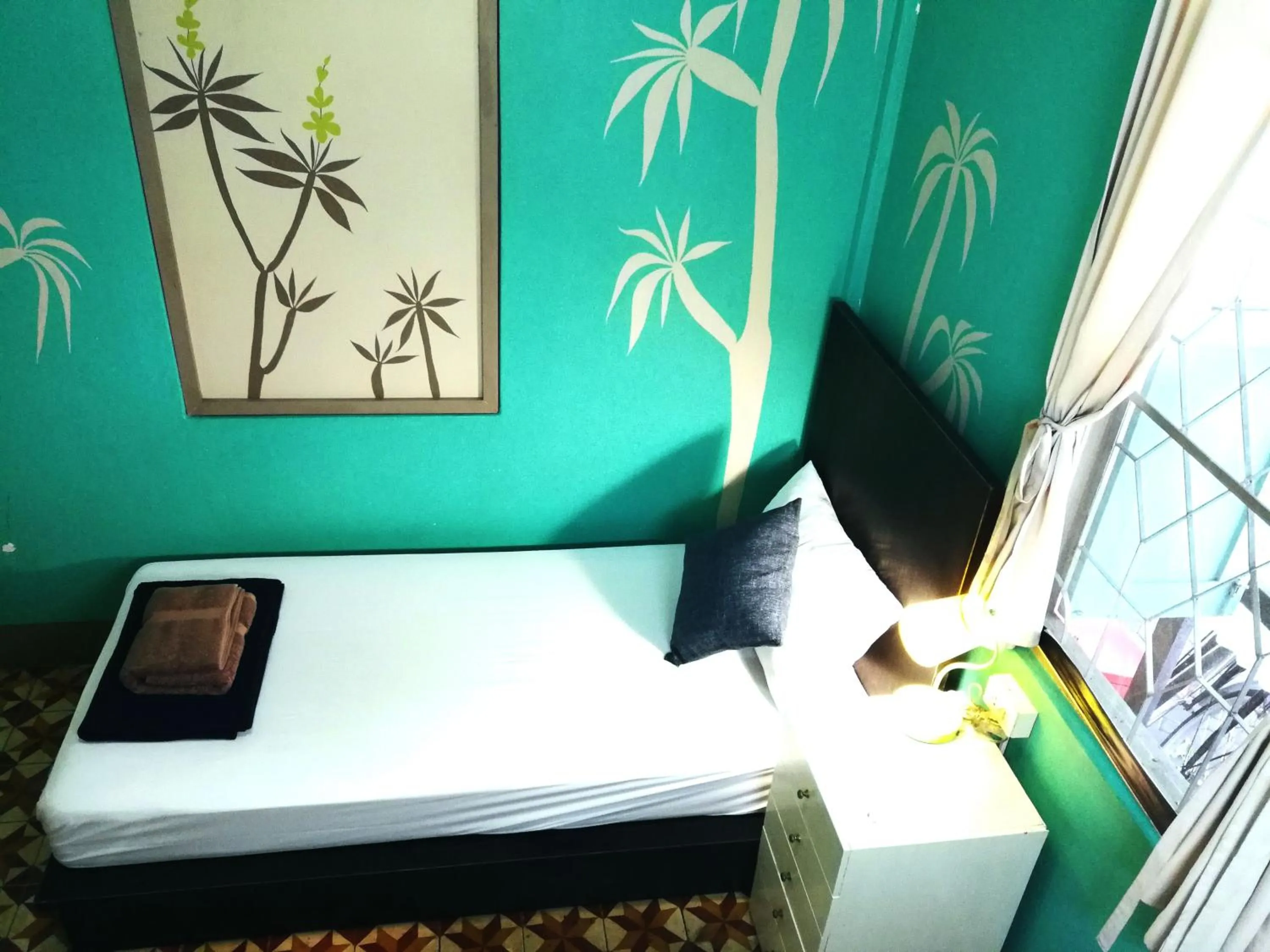 Bedroom, Bed in 60 Blue House