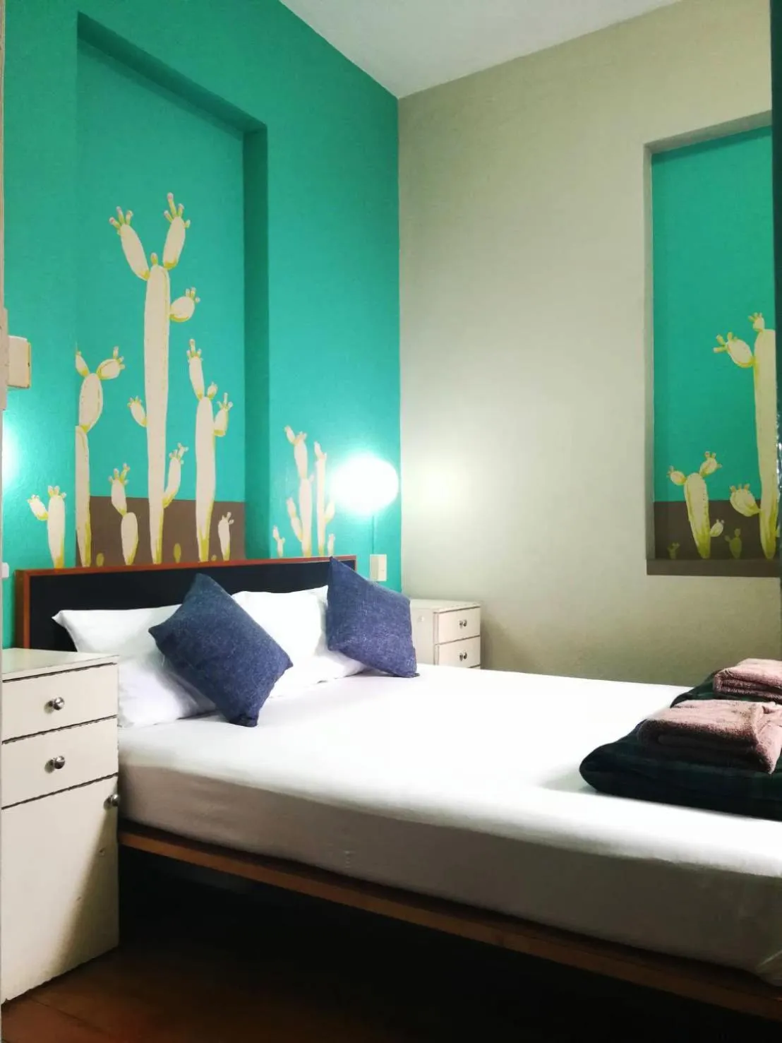 Bedroom, Bed in 60 Blue House