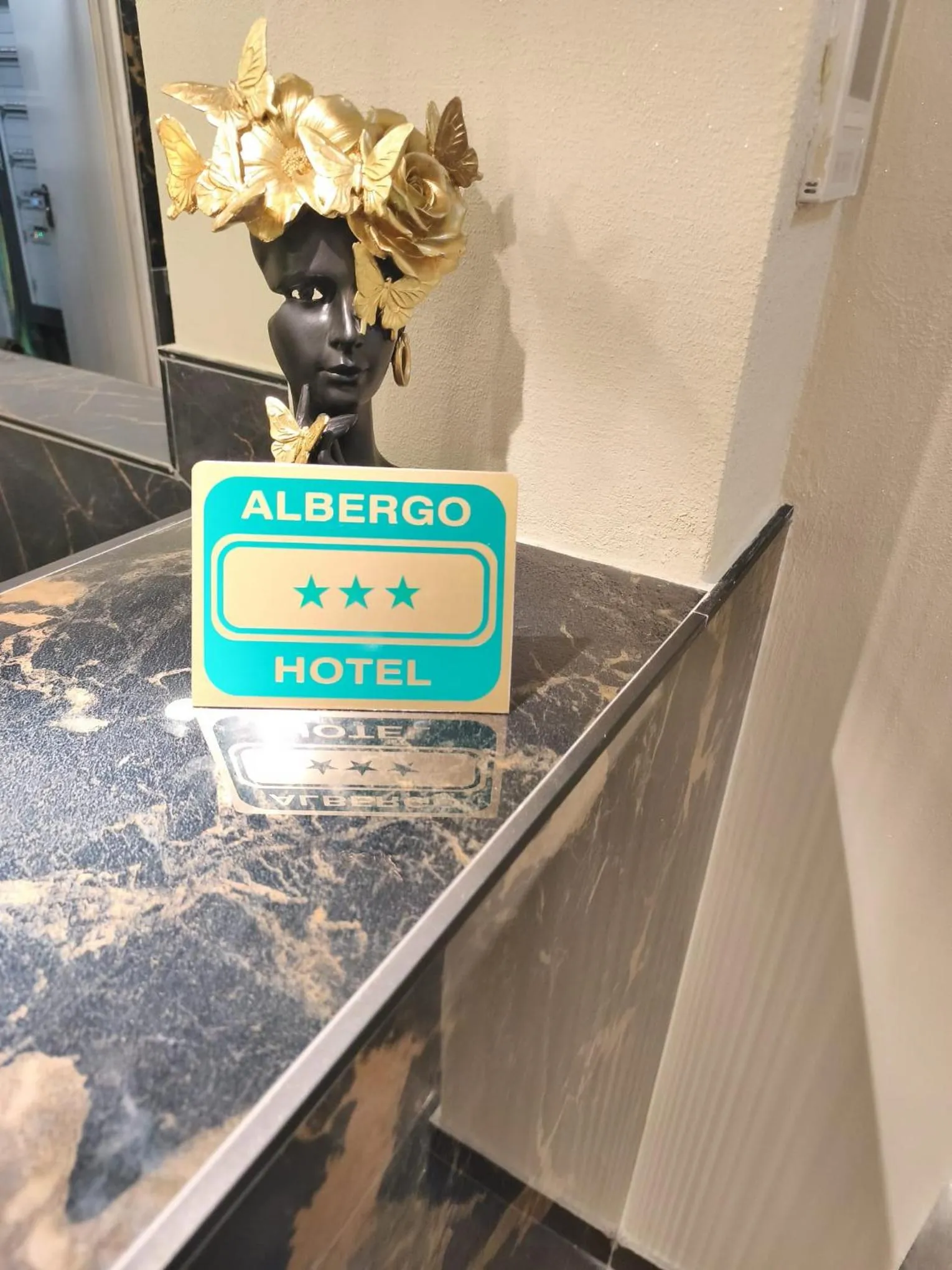Property logo or sign in Hotel V7