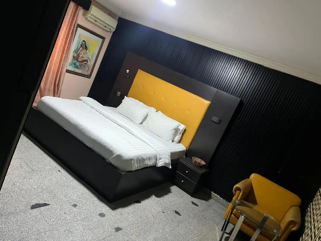 Bed in Hotel Paris Suites