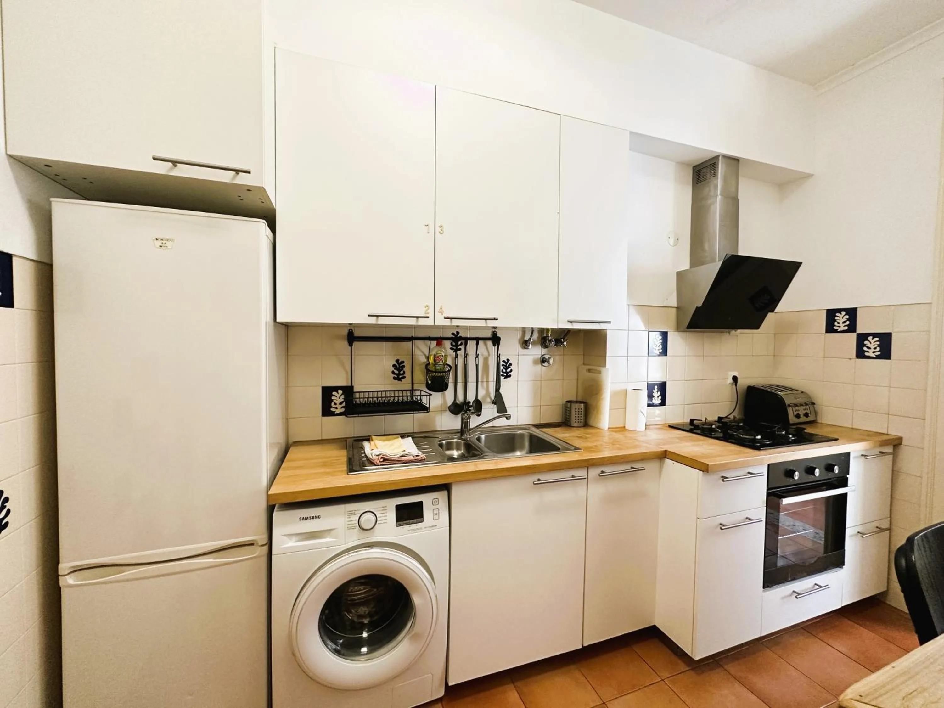Kitchen or kitchenette in Estrela Charming Rooms by HOST-POINT