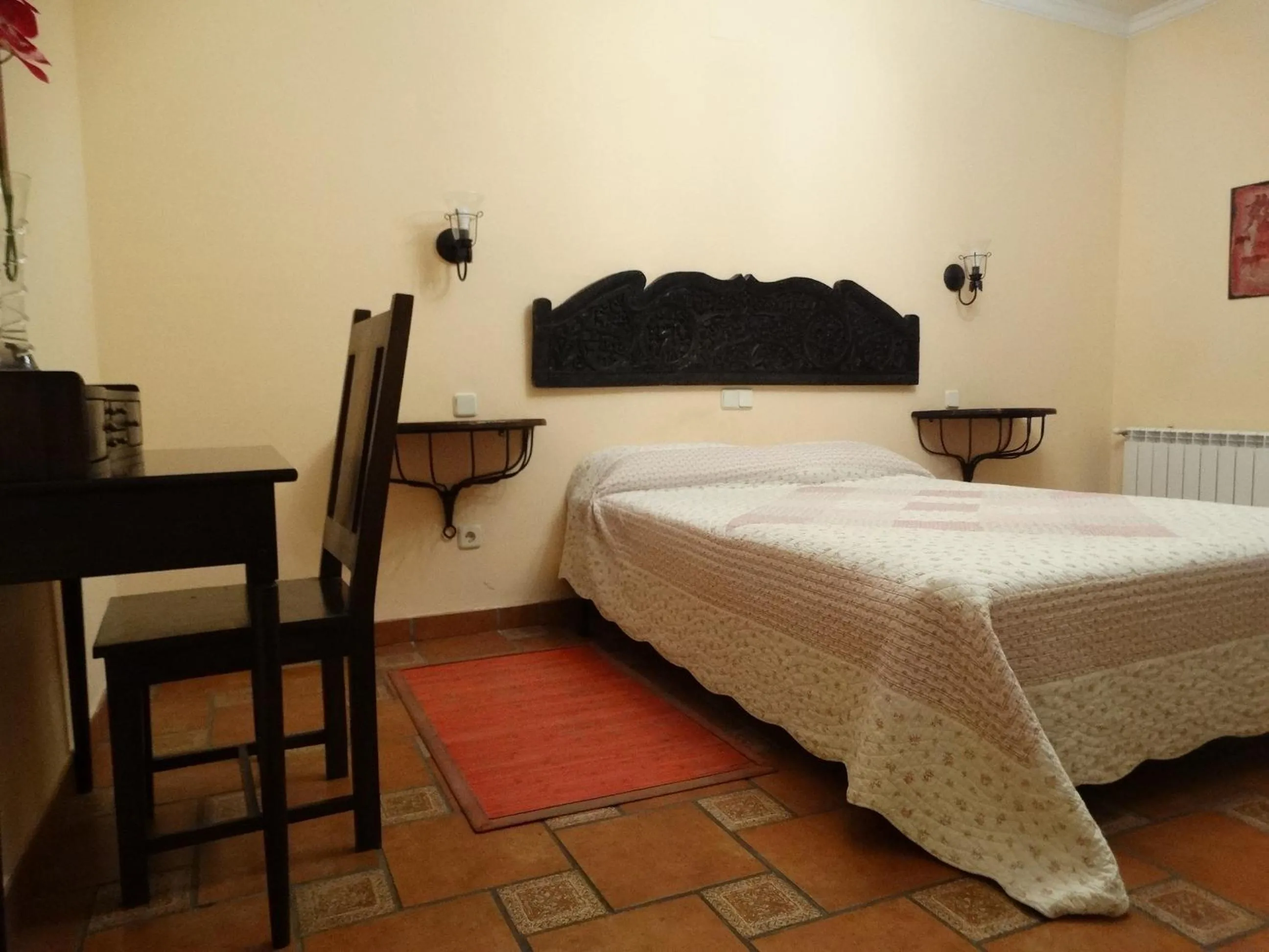 Bed in Hostal EL MESON