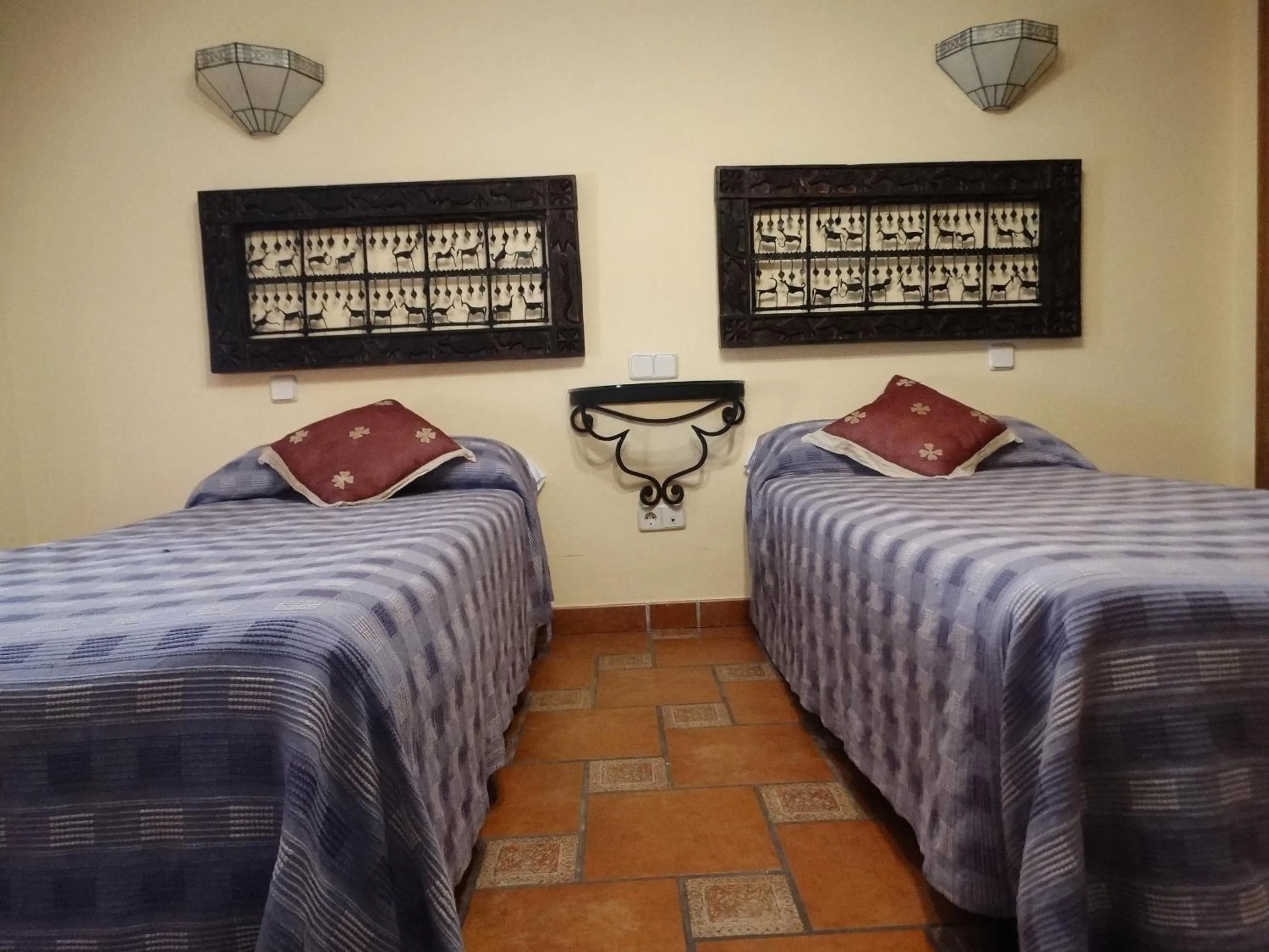 Bed in Hostal EL MESON