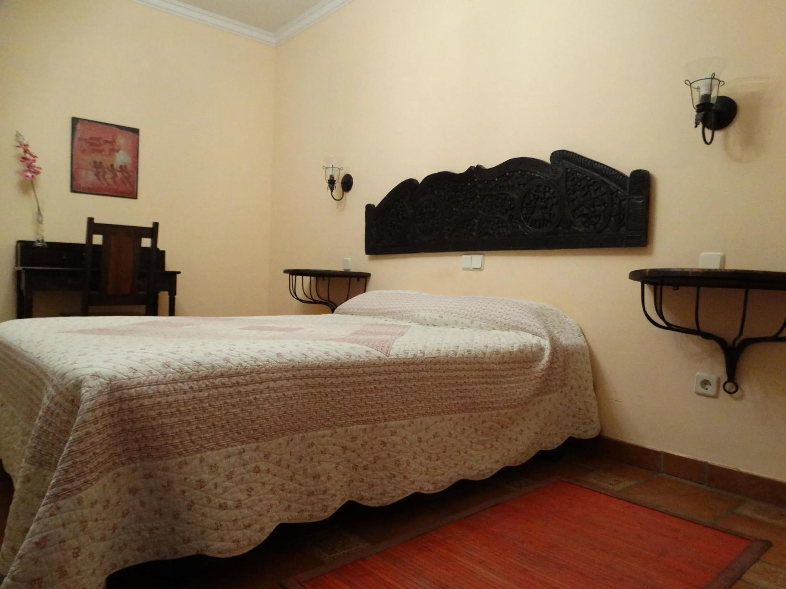 Bed in Hostal EL MESON