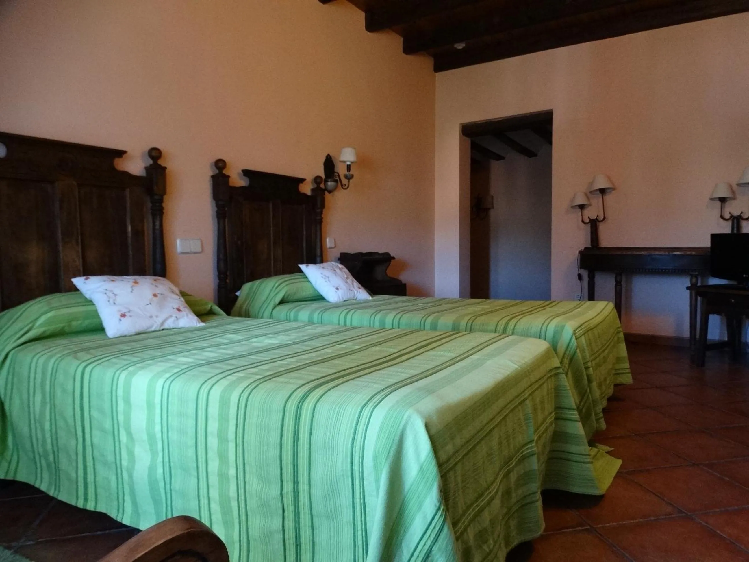 Bed in Hostal EL MESON