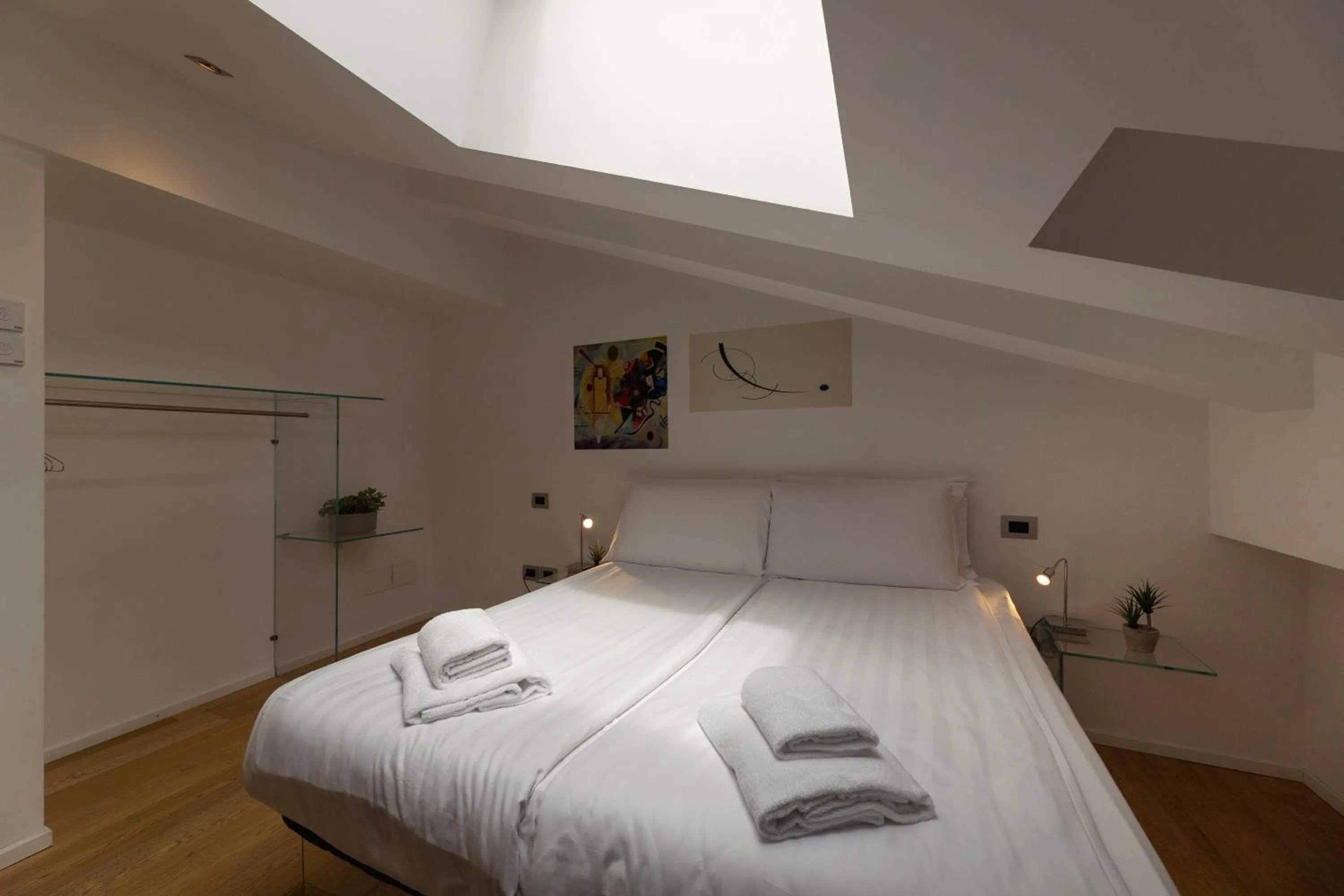 Bed in HEART OF TRENTO Loft & Rooms