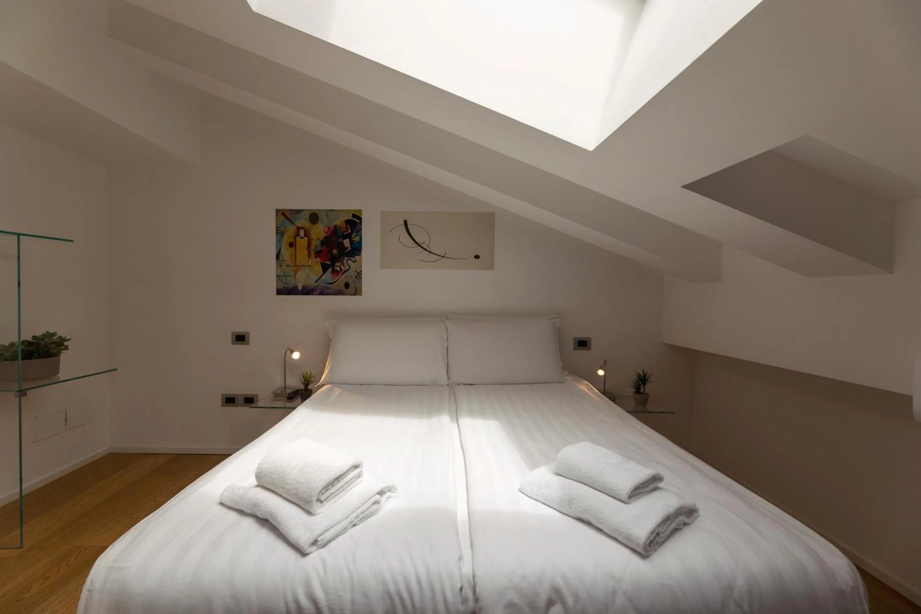 Bed in HEART OF TRENTO Loft & Rooms