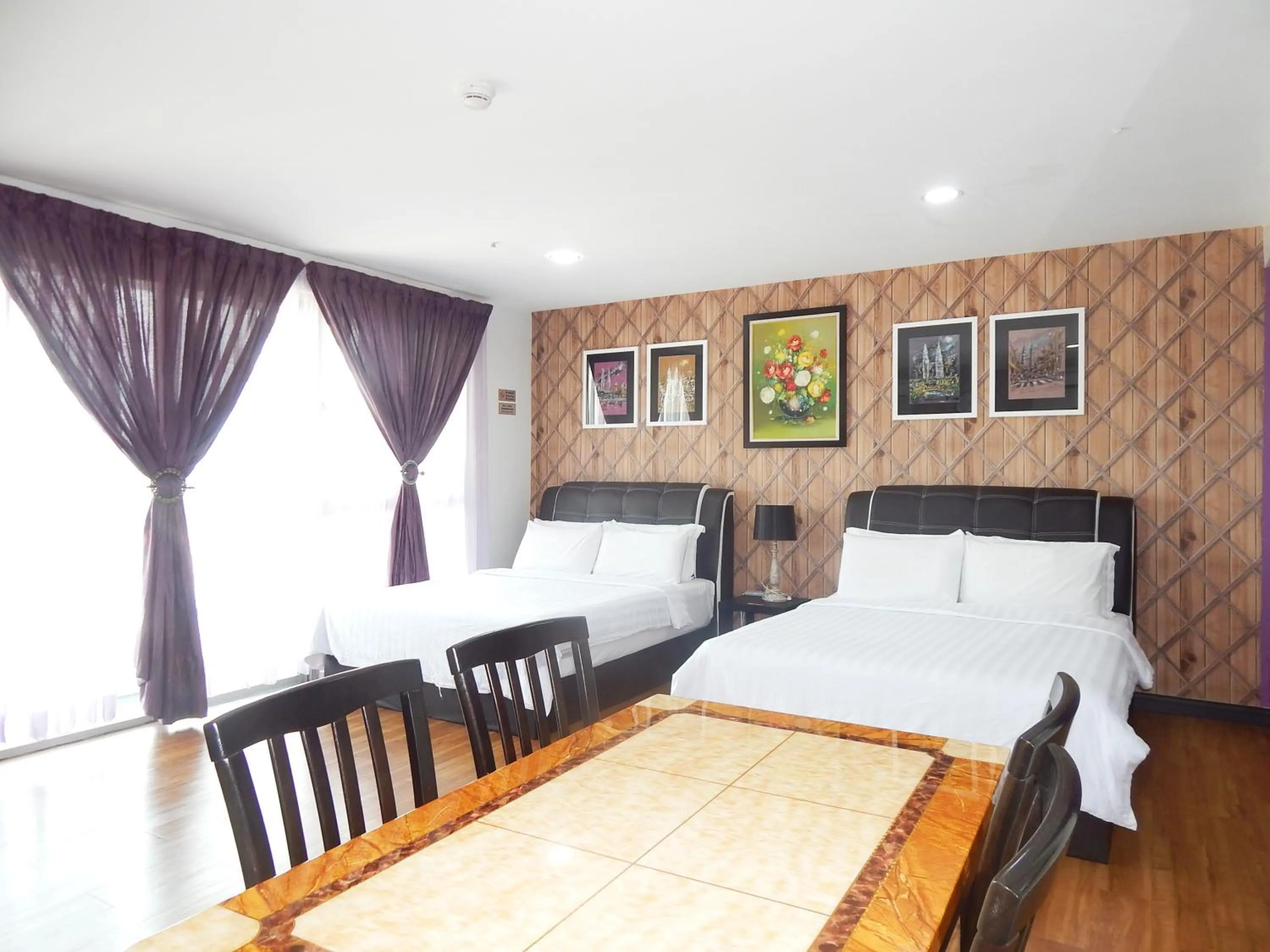 Bedroom, Bed in Wadi Iman Guesthouse @ i-City