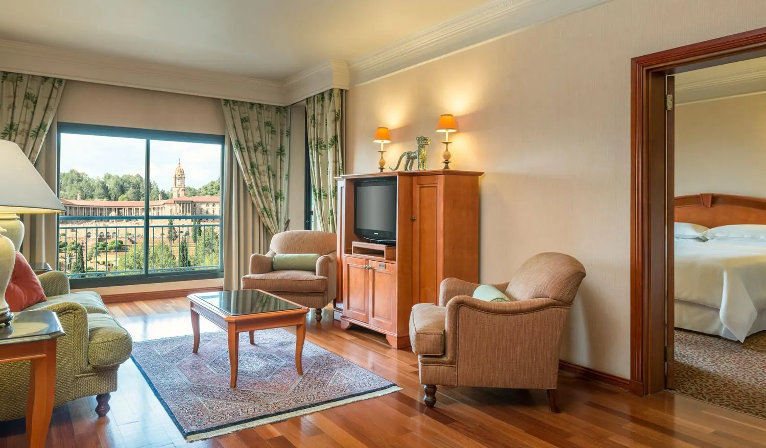 Seating area, Bed in CT Hotel