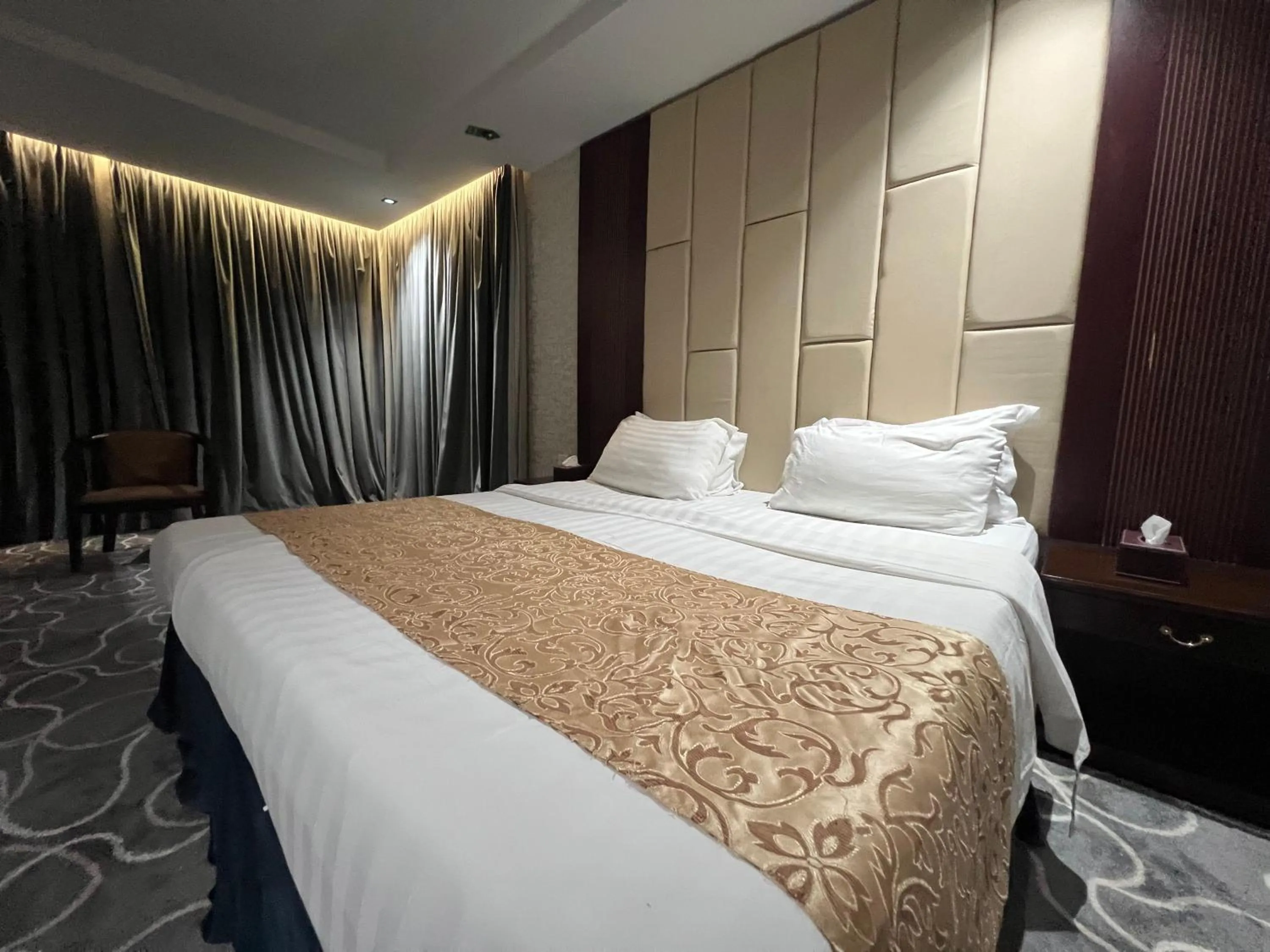 Bed in Rose Star Hotel