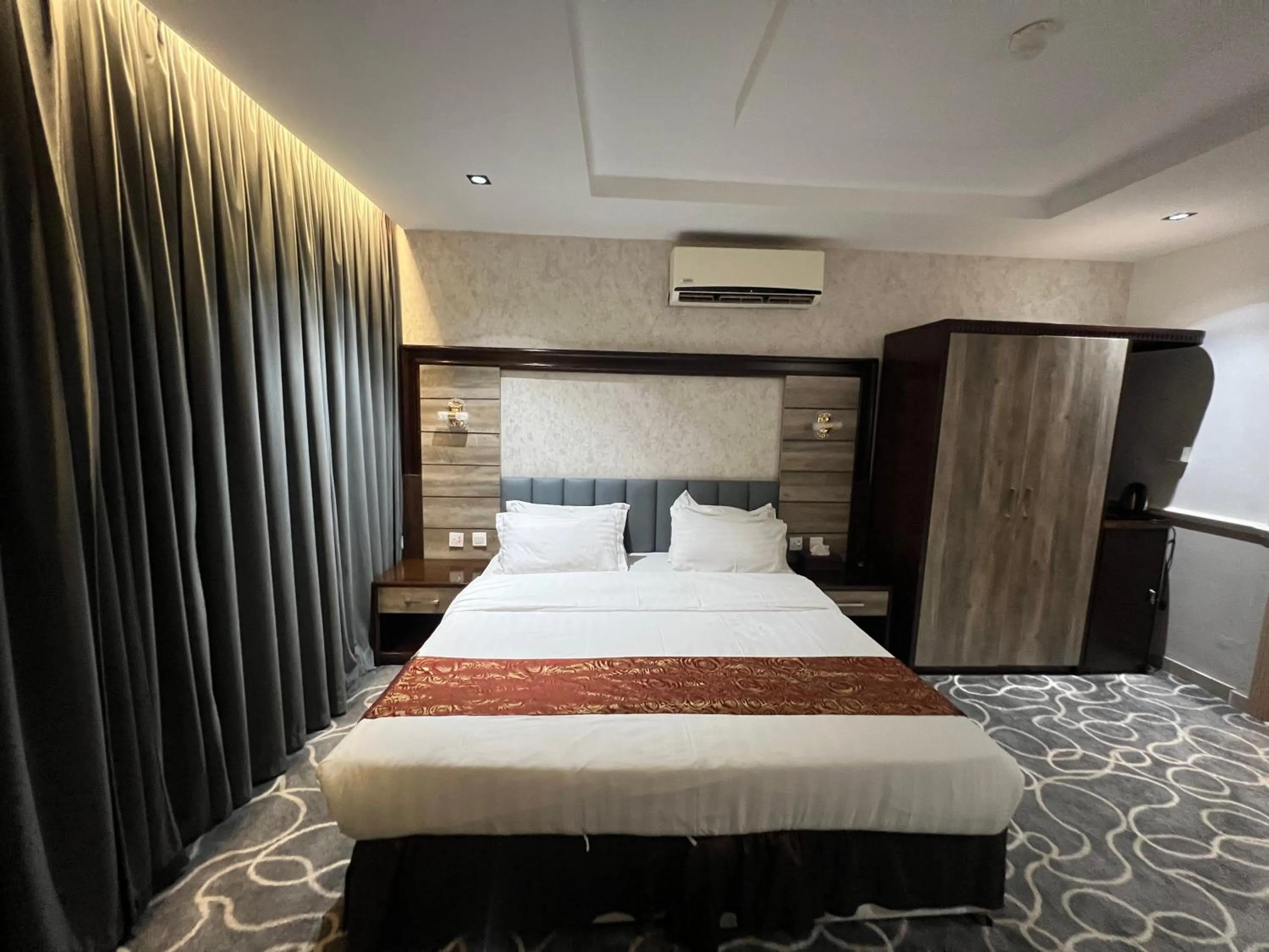 Bed in Rose Star Hotel