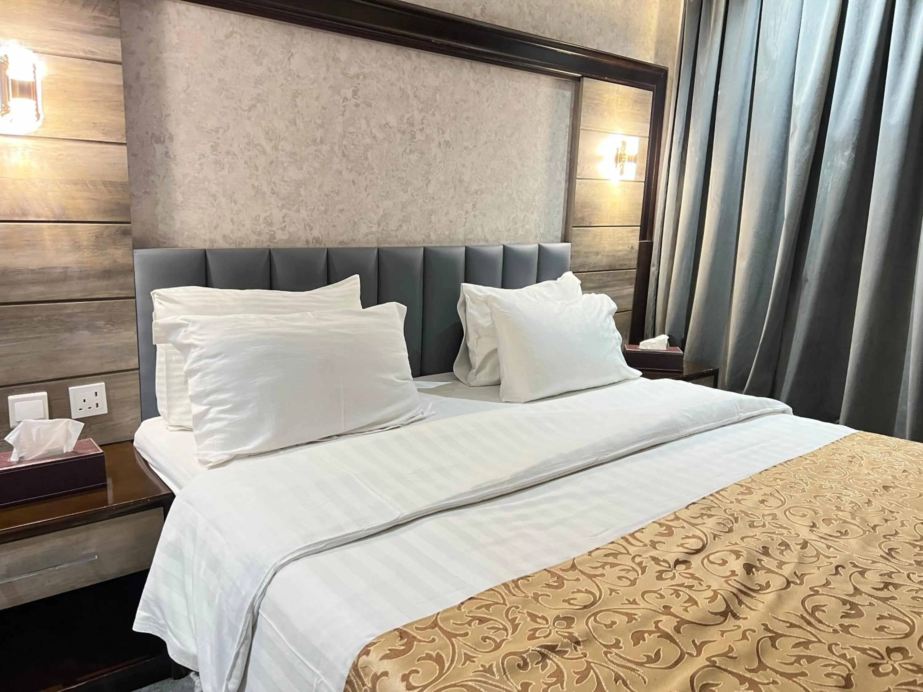 Bed in Rose Star Hotel