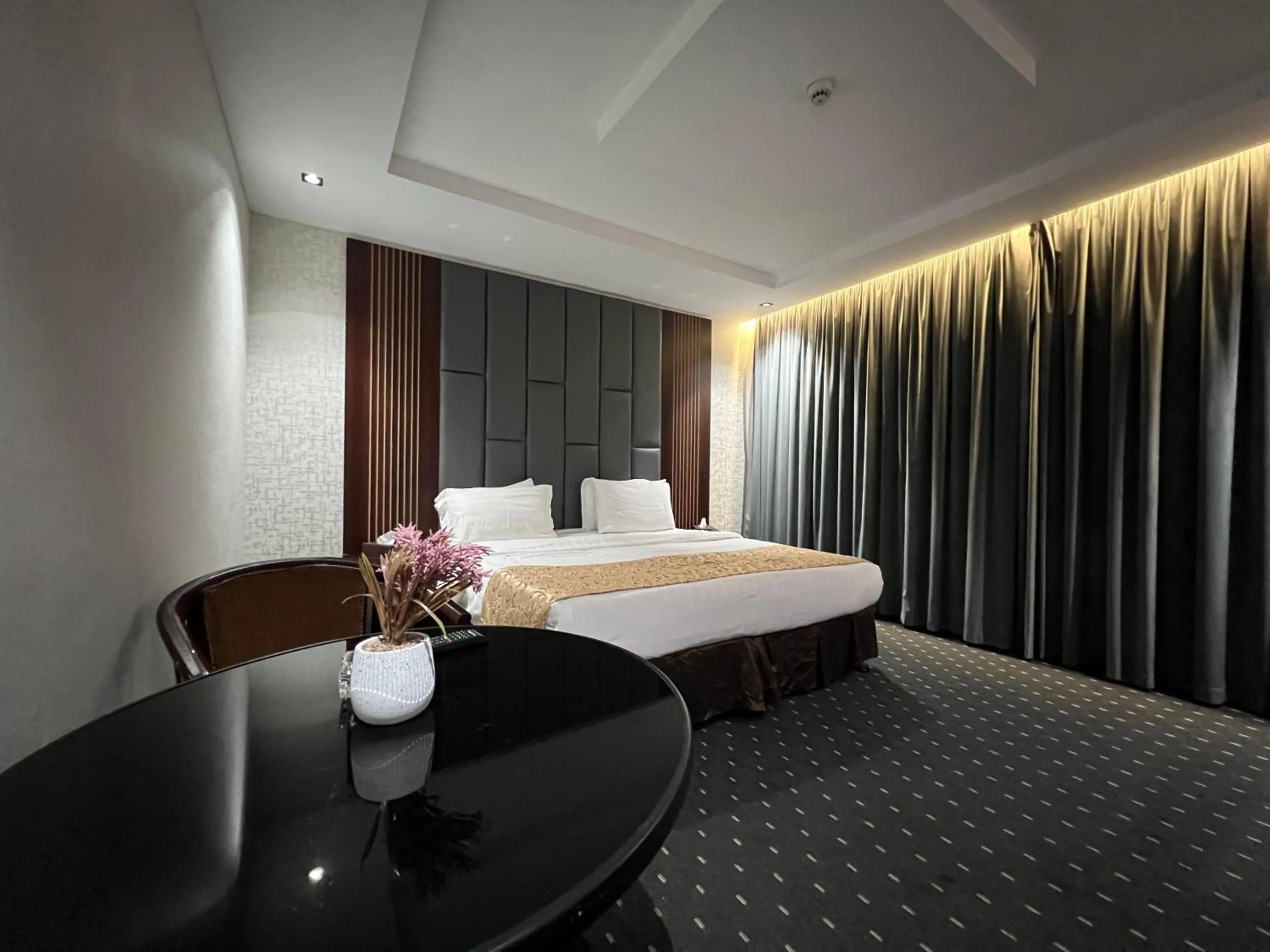 Bed in Rose Star Hotel