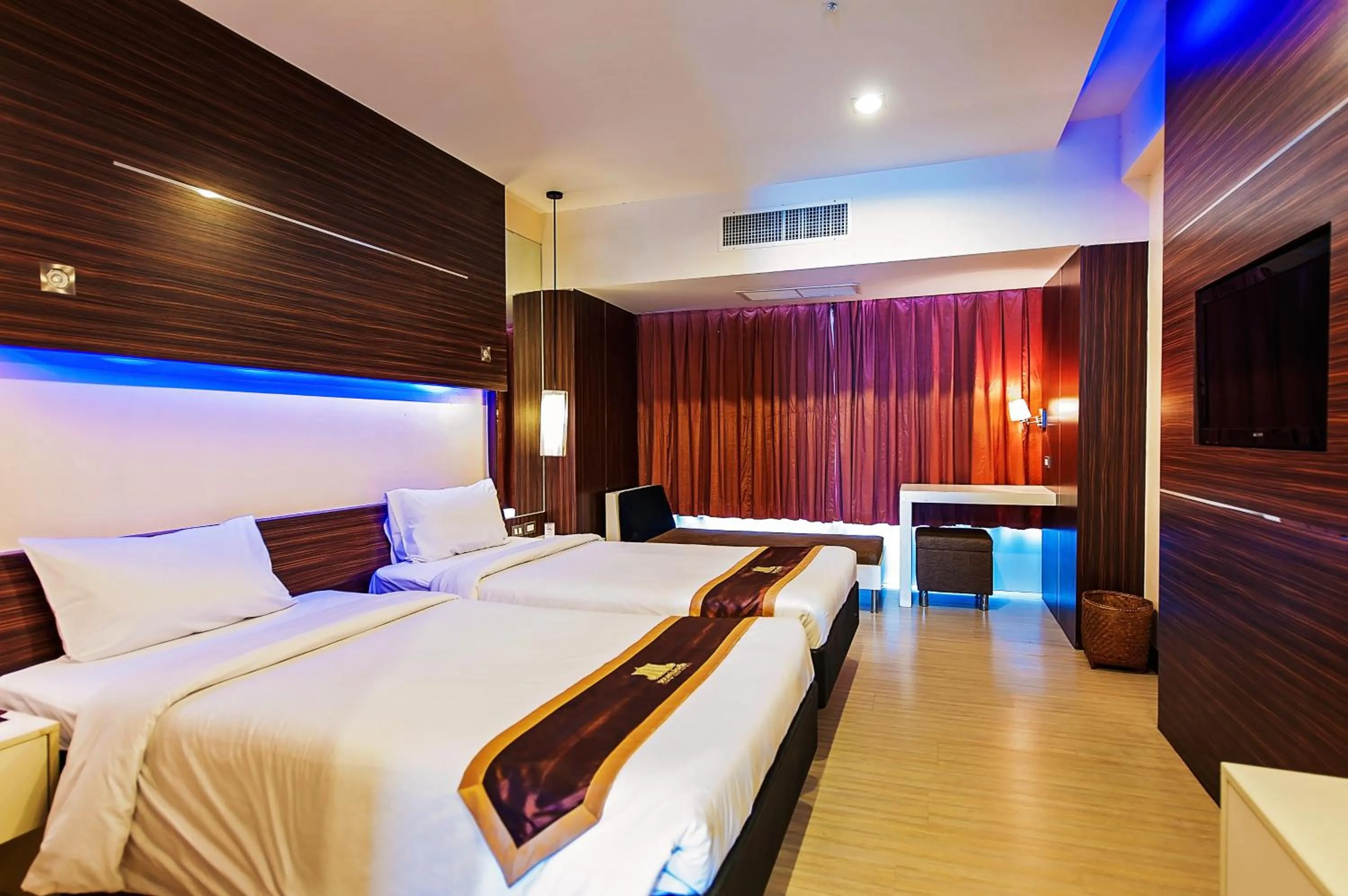 Bed in Khon Kaen Hotel