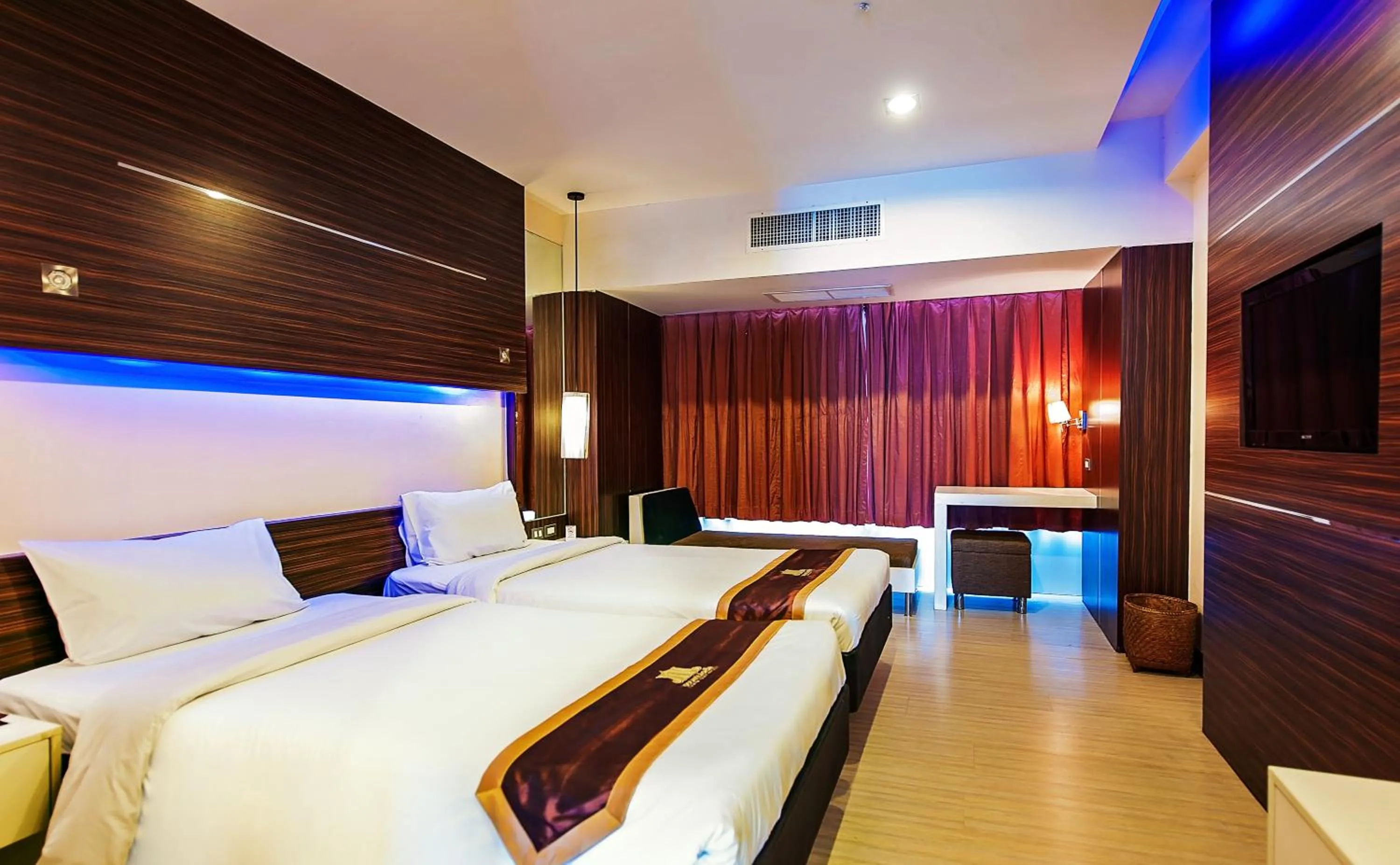 Bed in Khon Kaen Hotel