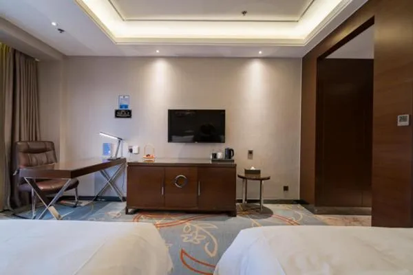 Bed in Meilun Hotel, Tianjin Binhai Development Zone