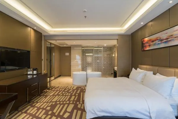 Bed in Meilun Hotel, Tianjin Binhai Development Zone