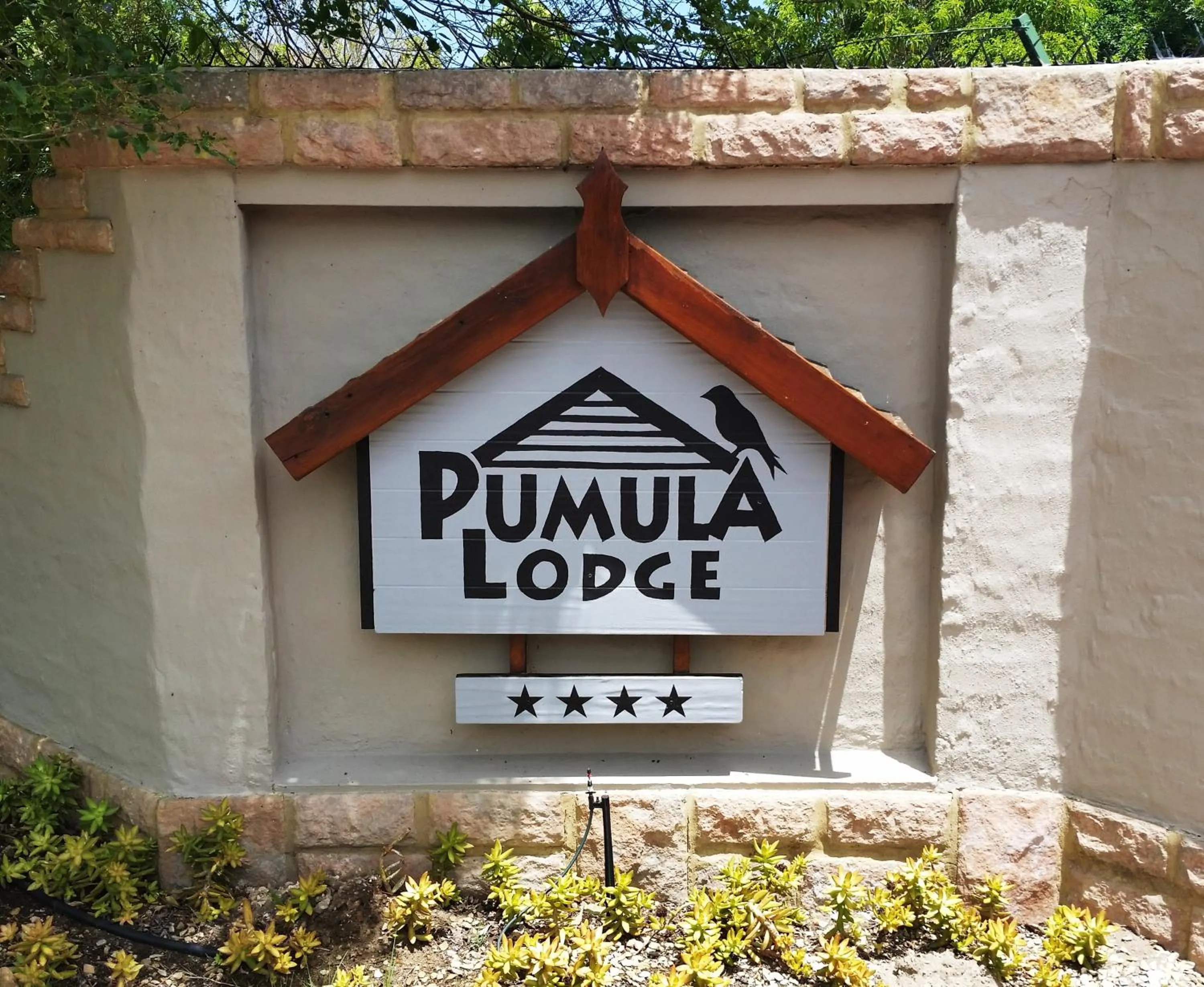 Property logo or sign in Pumula Lodge 4 Star Guesthouse Knysna