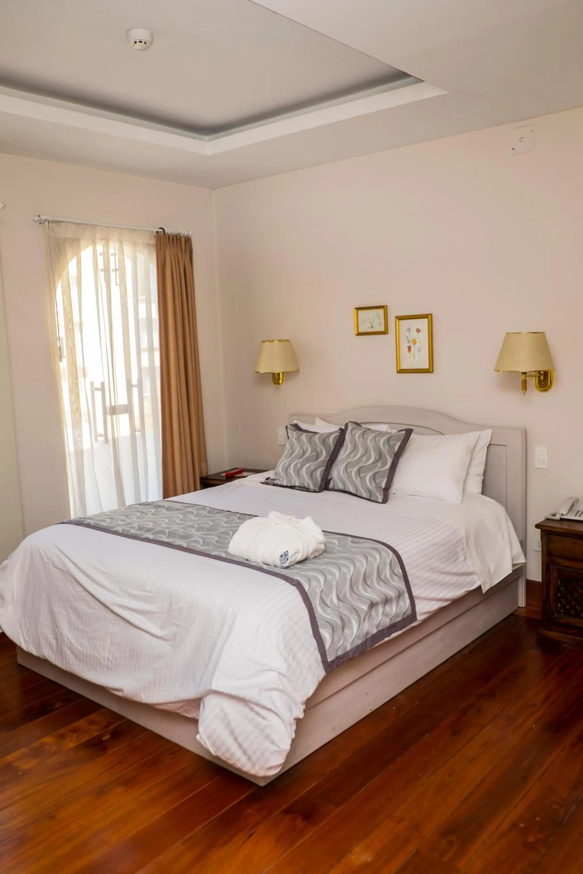 Bed in La Coupole Hotel