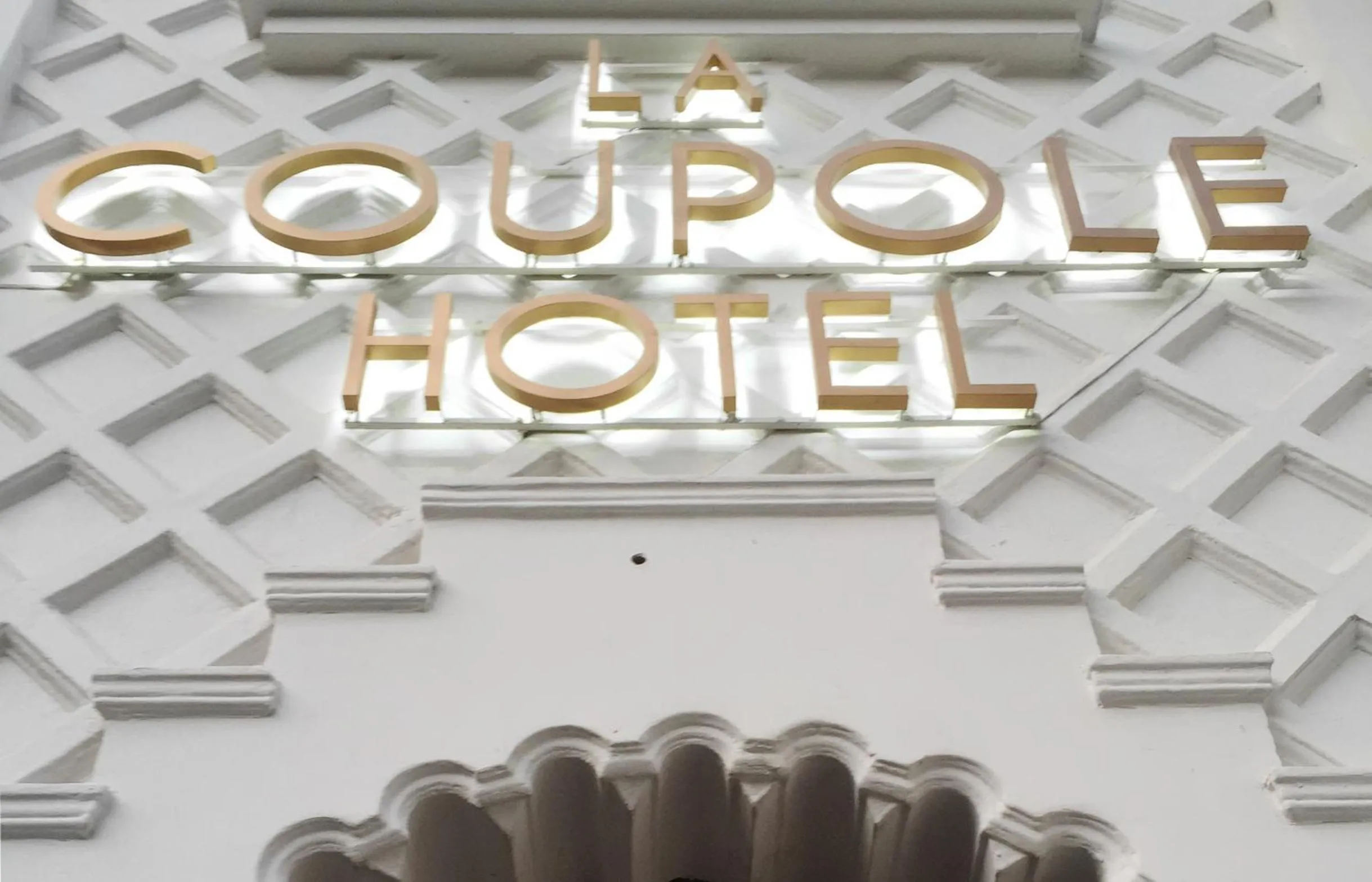 Property logo or sign in La Coupole Hotel