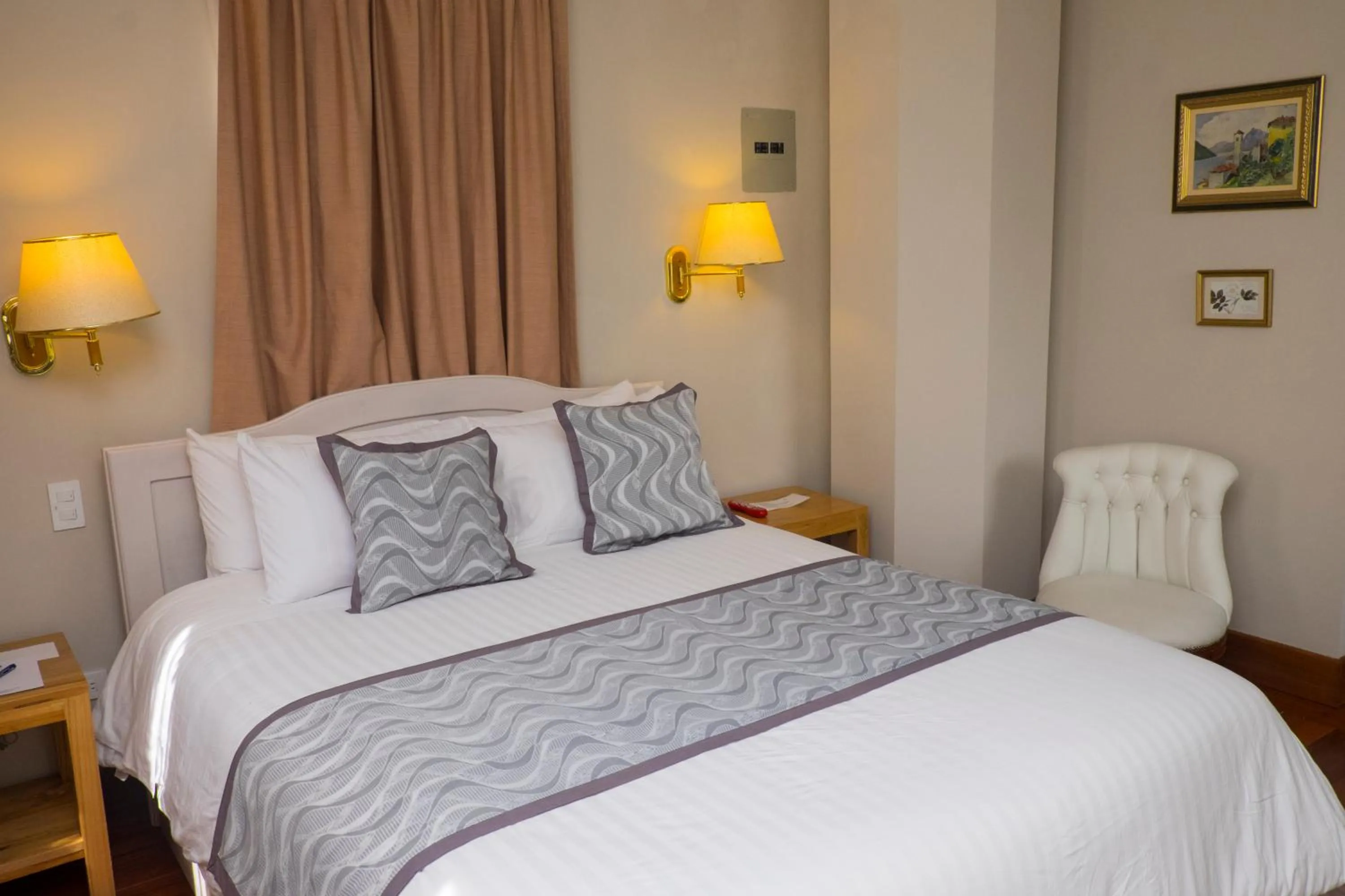 Bed in La Coupole Hotel