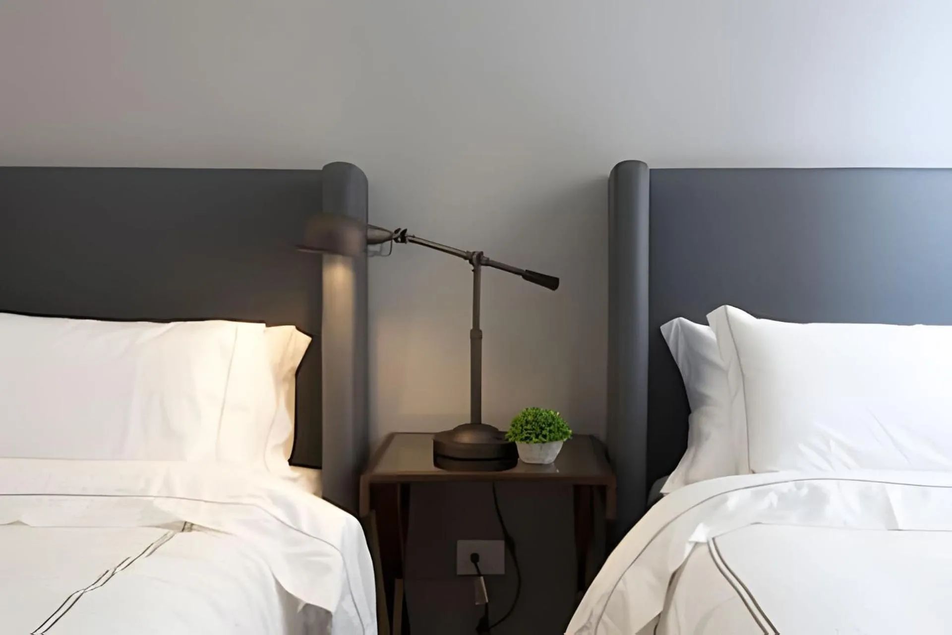 Bed in Attik Luxury Apts