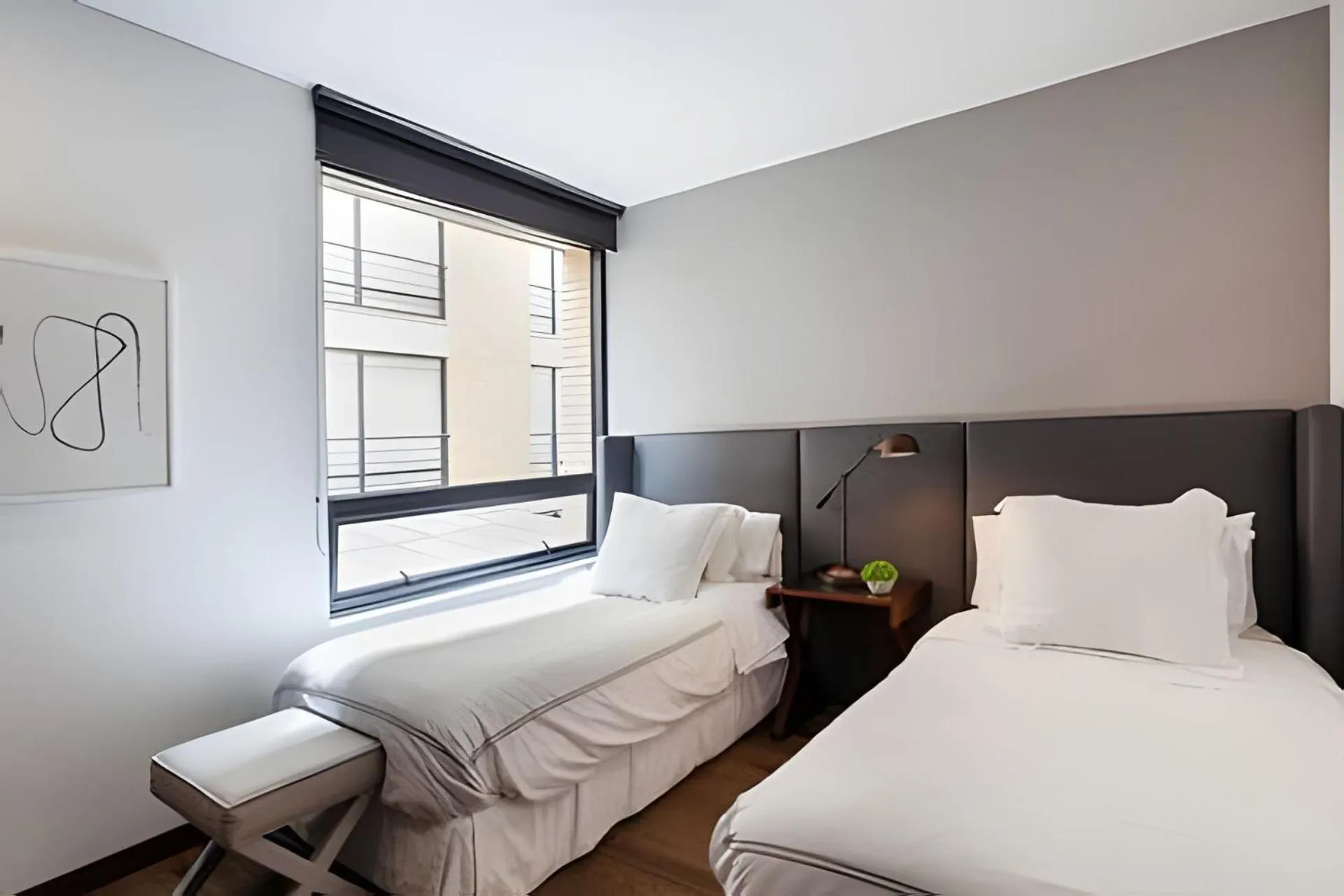 Bed in Attik Luxury Apts