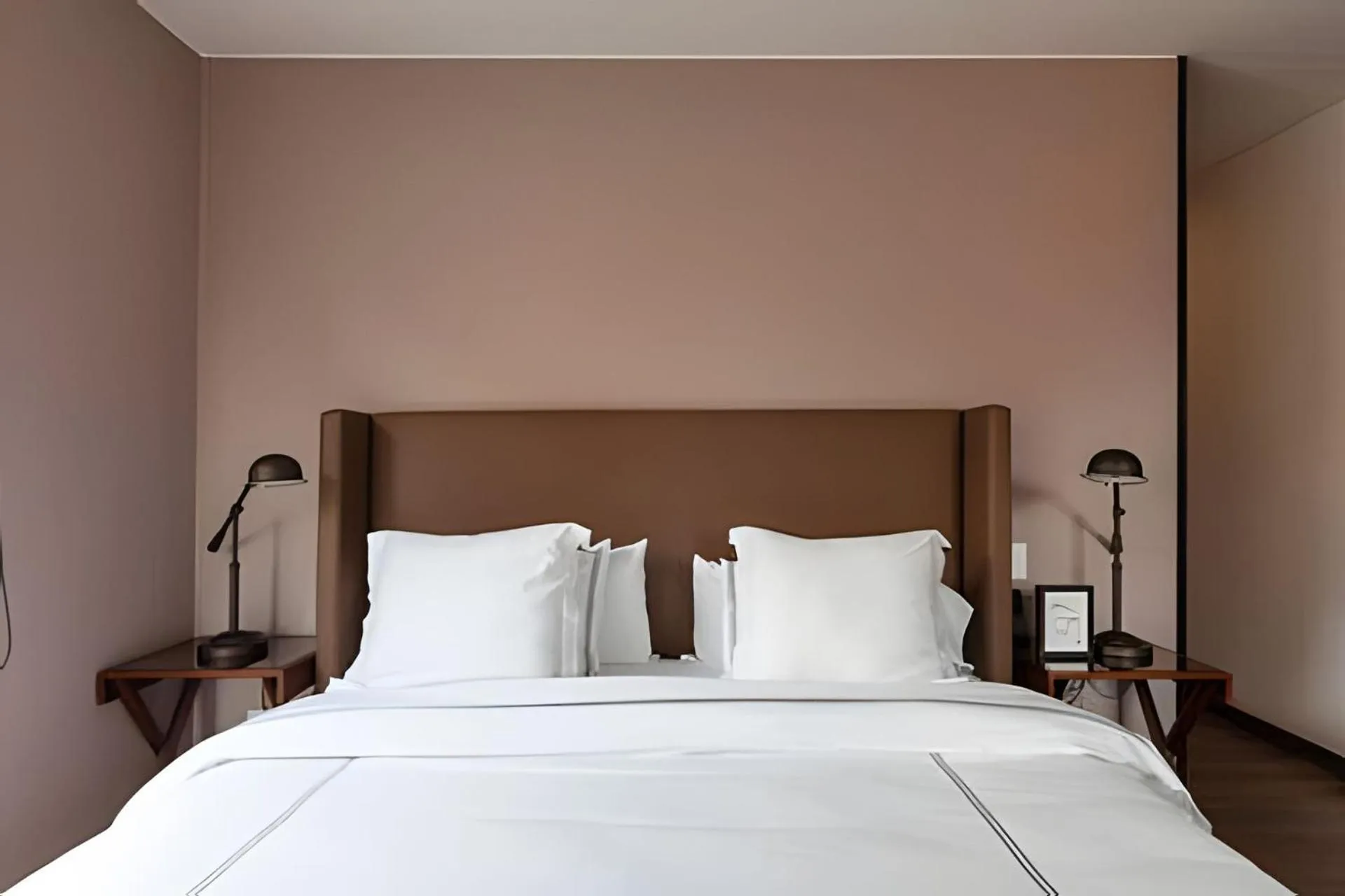 Bed in Attik Luxury Apts