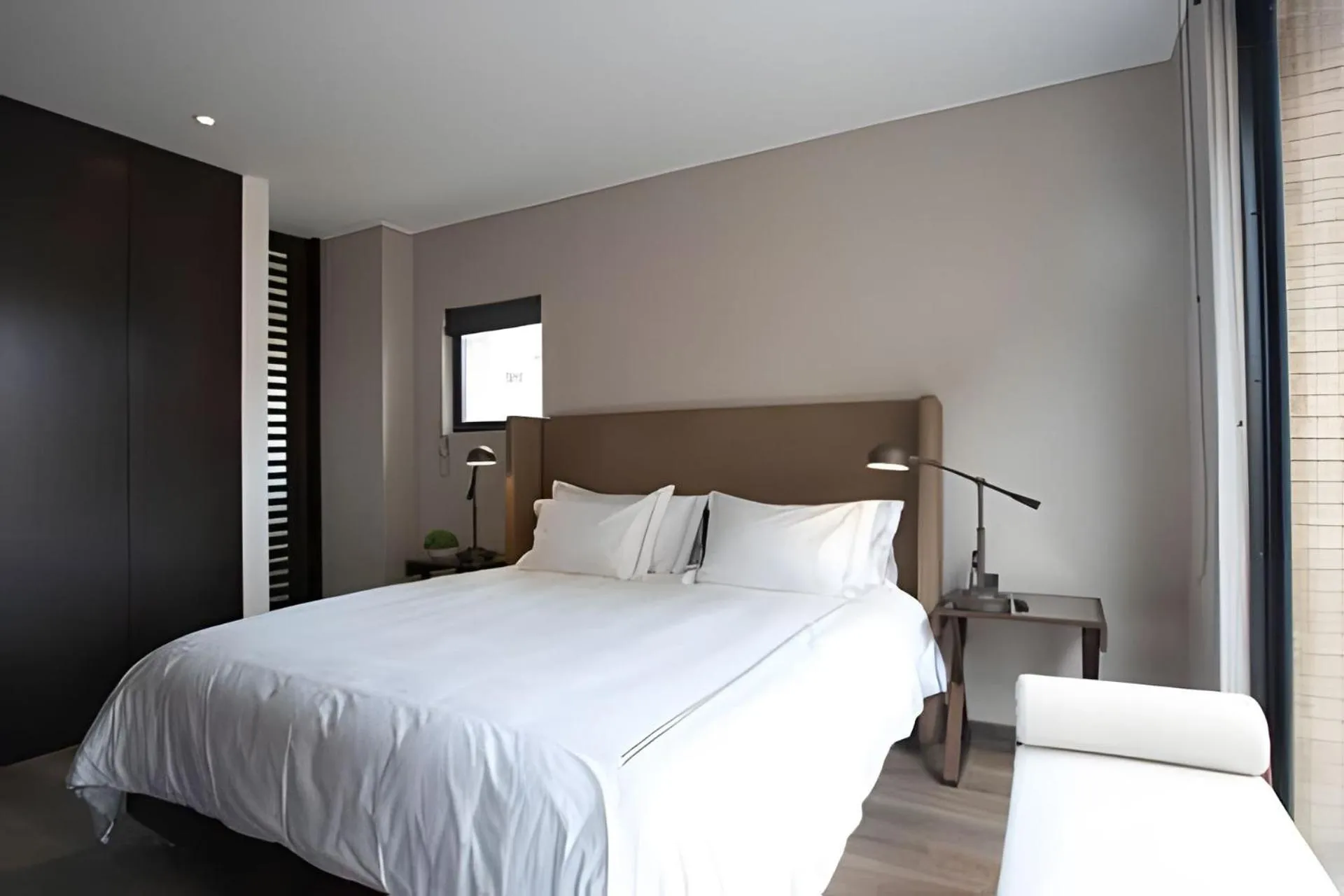 Bed in Attik Luxury Apts