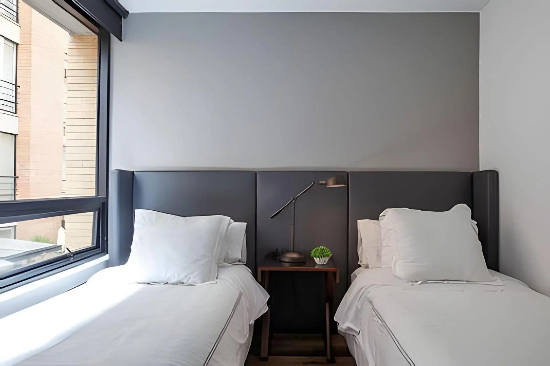 Bed in Attik Luxury Apts