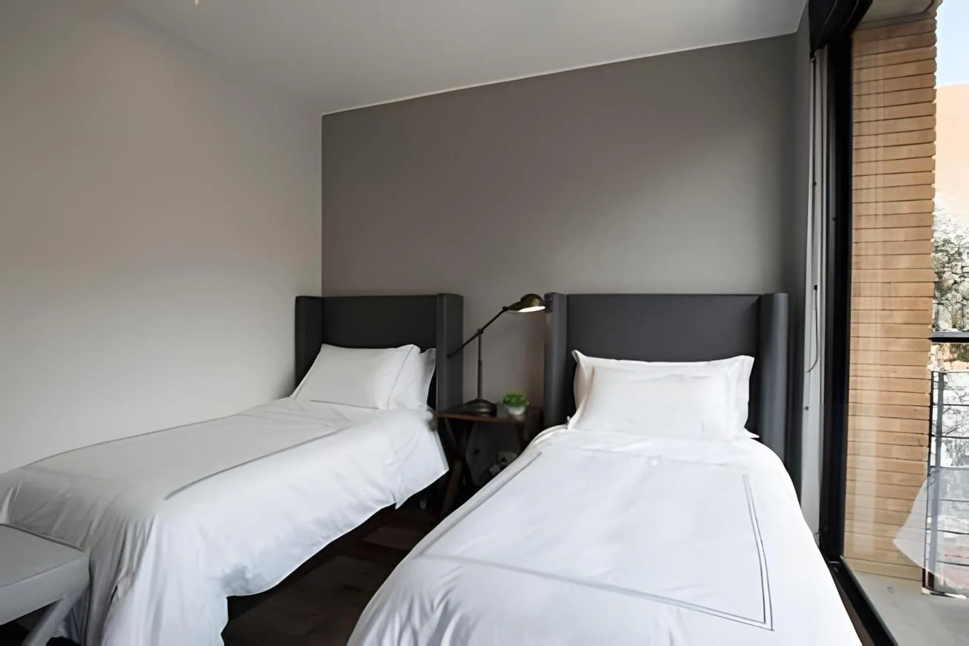 Bed in Attik Luxury Apts