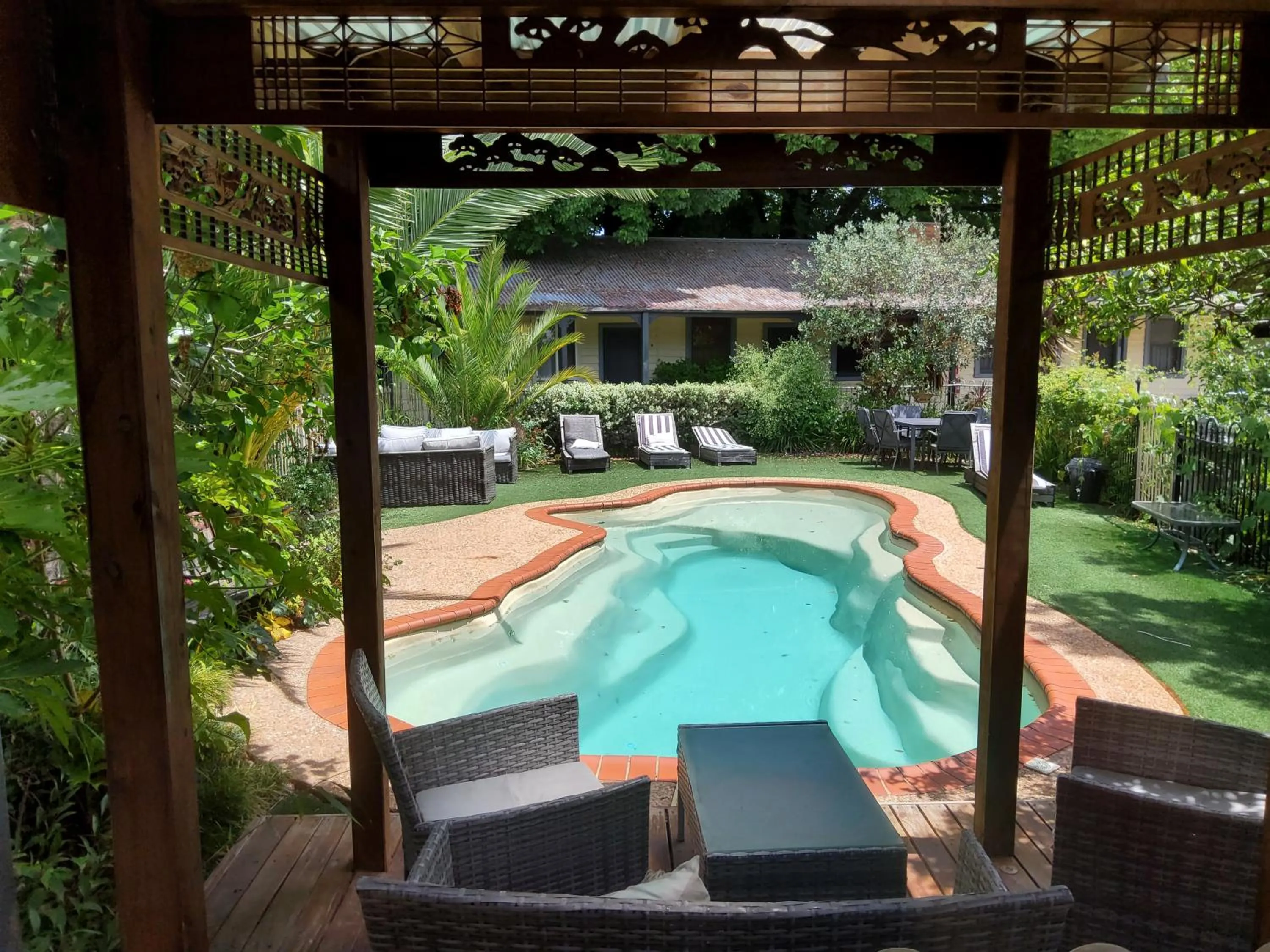 Swimming pool in Coach House Inn
