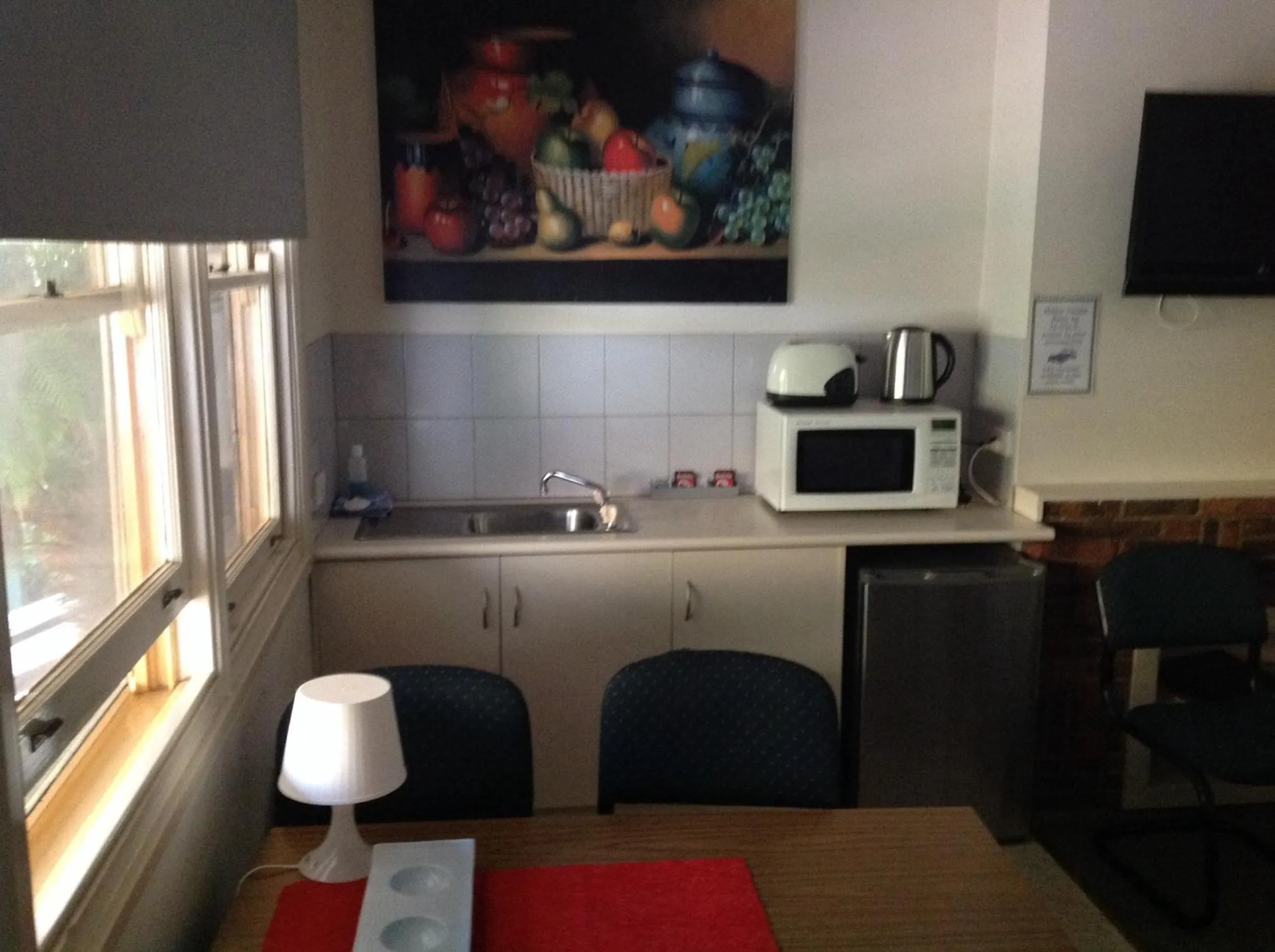 Kitchen or kitchenette in Coach House Inn