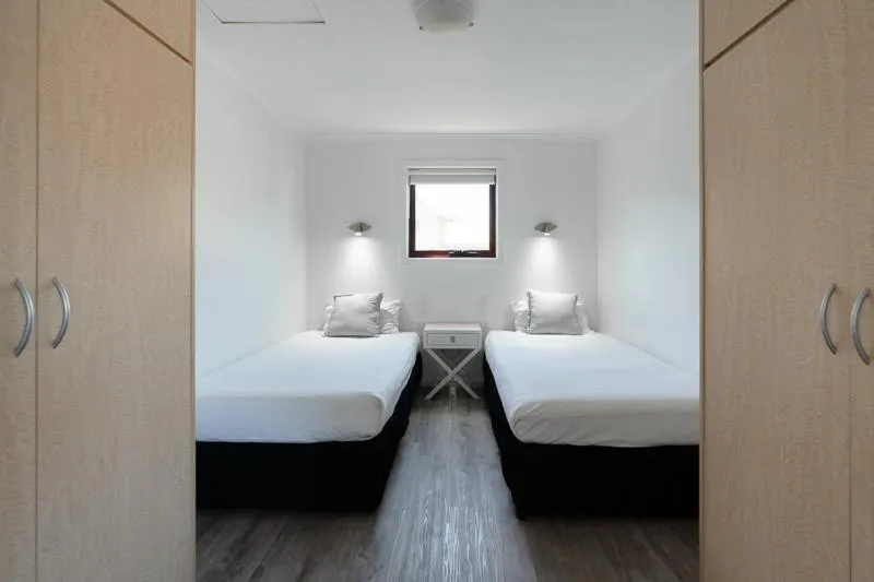 Bedroom, Bed in Adelaide Caravan Park - Aspen Holiday Parks