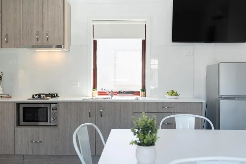 Kitchen or kitchenette in Adelaide Caravan Park - Aspen Holiday Parks