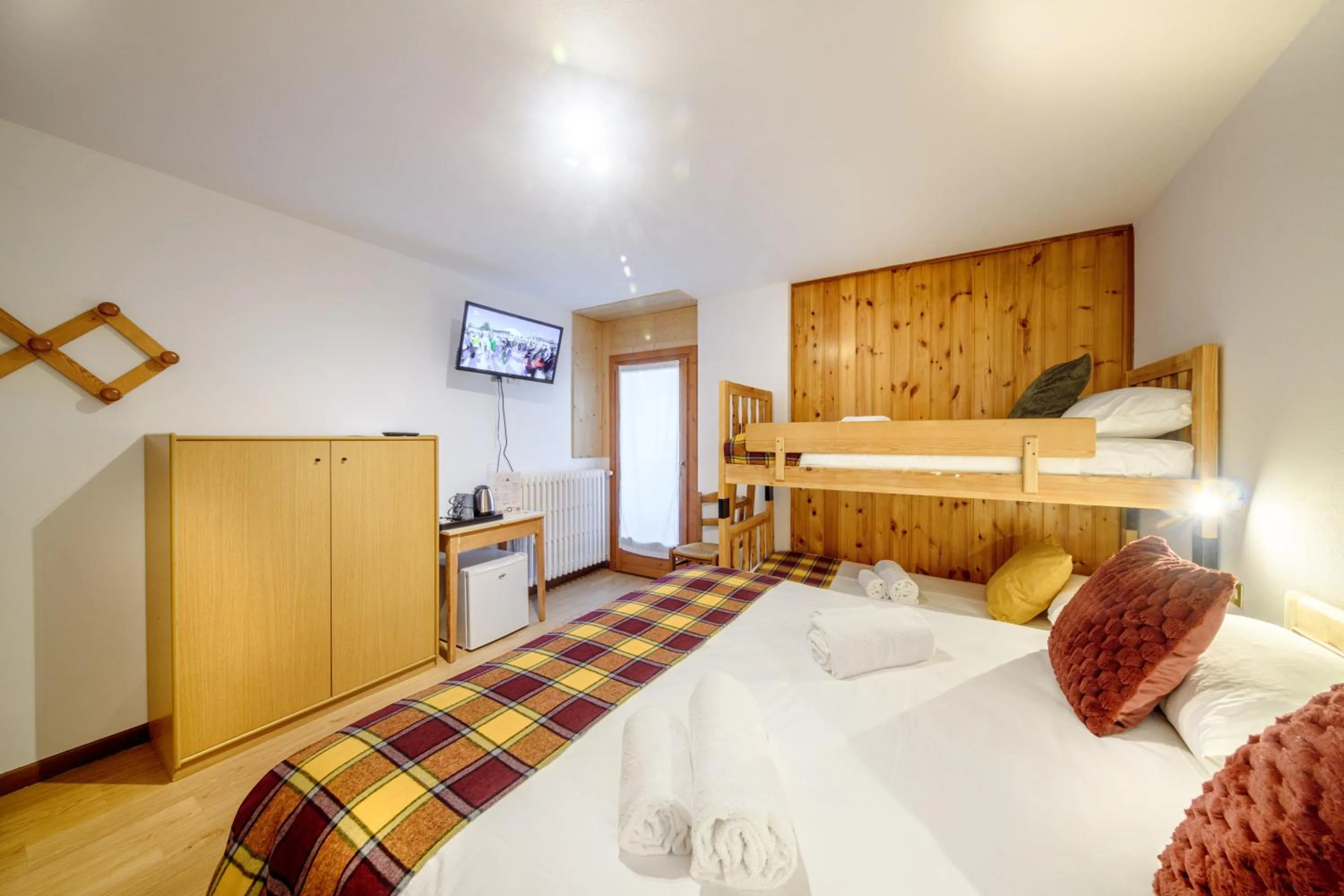 Bed in Hotel Ambassador Bormio