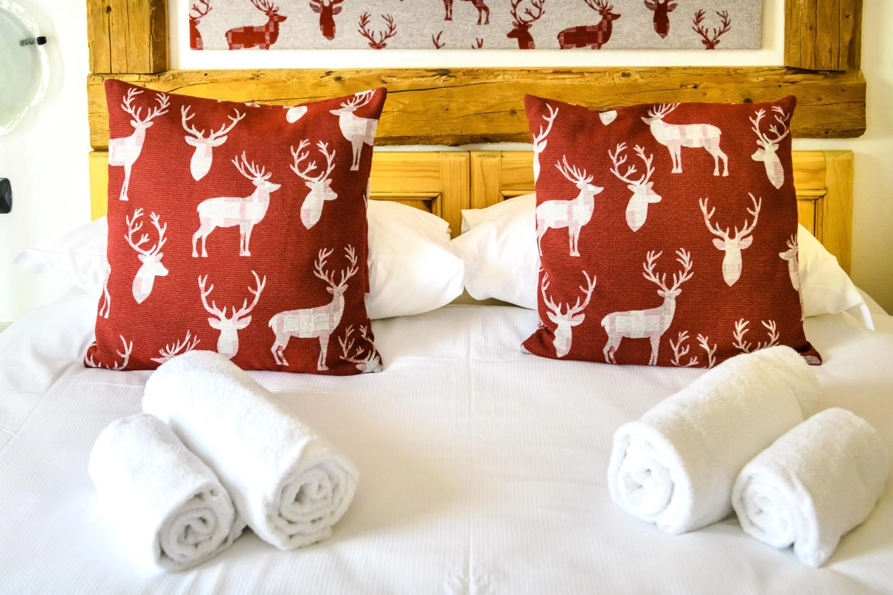 Bed in Hotel Ambassador Bormio
