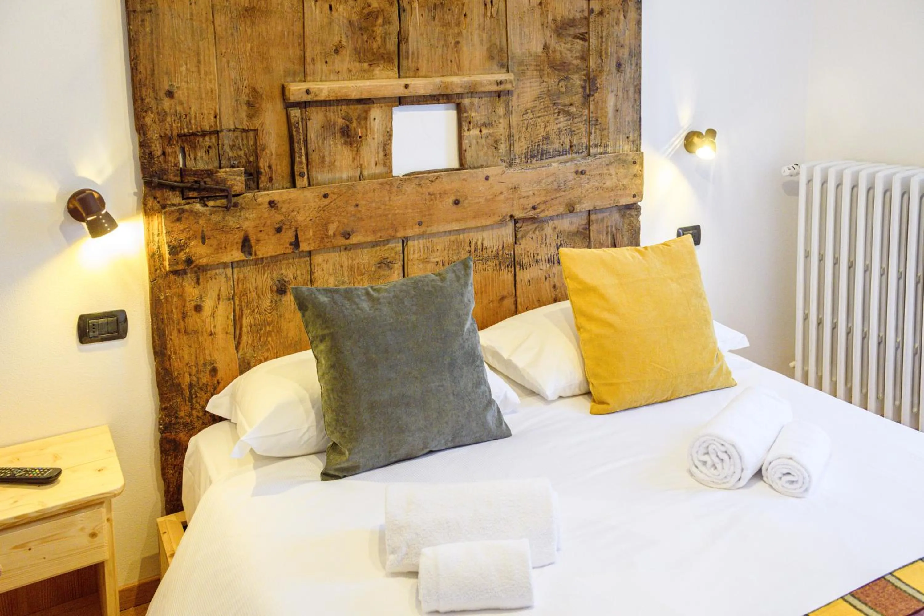 Bed in Hotel Ambassador Bormio