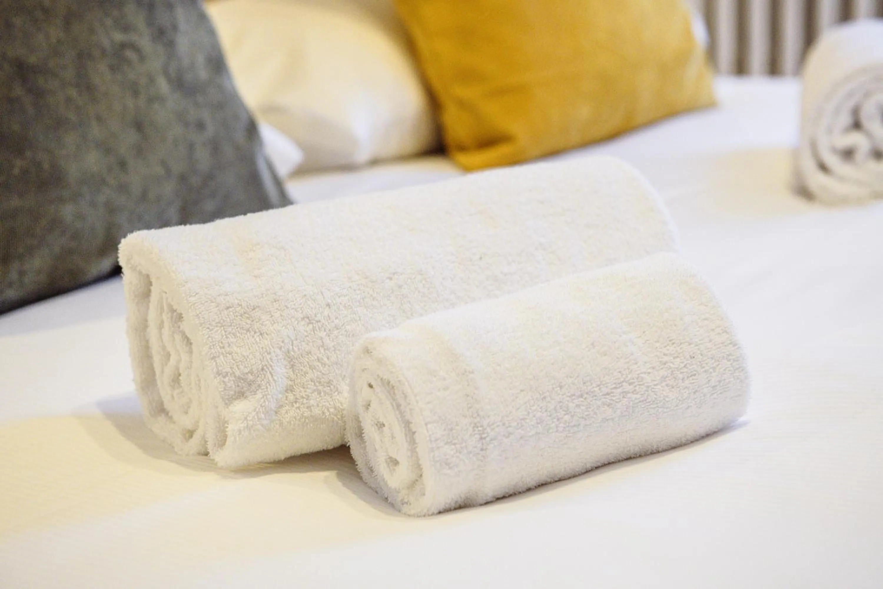 towels, Bed in Hotel Ambassador Bormio