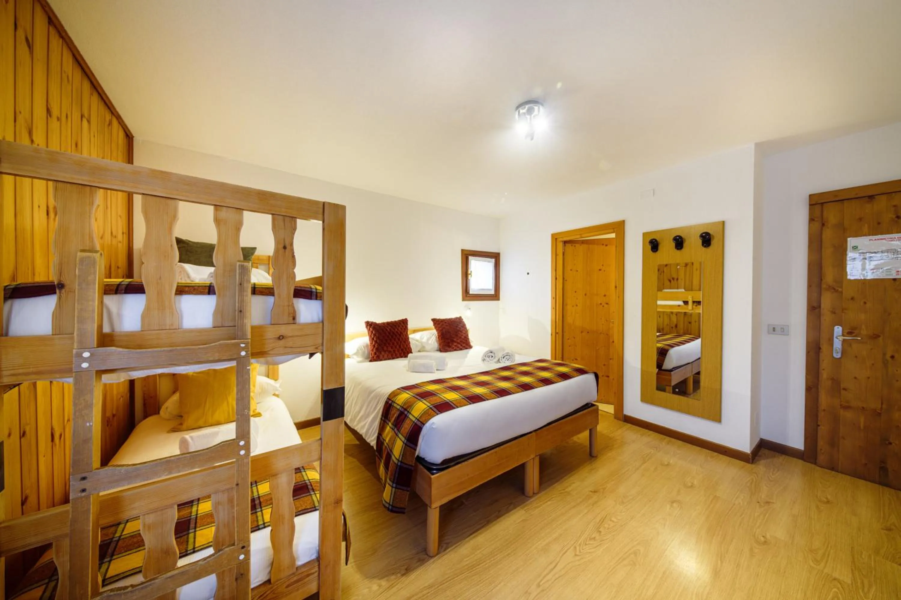 Bed in Hotel Ambassador Bormio