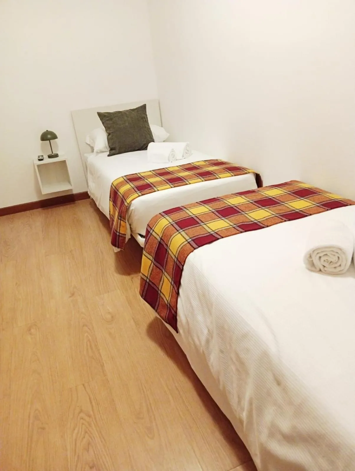 Bed in Hotel Ambassador Bormio