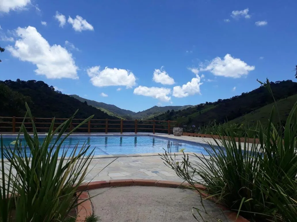 Swimming pool in Pousada Antigo Caminho Do Ouro