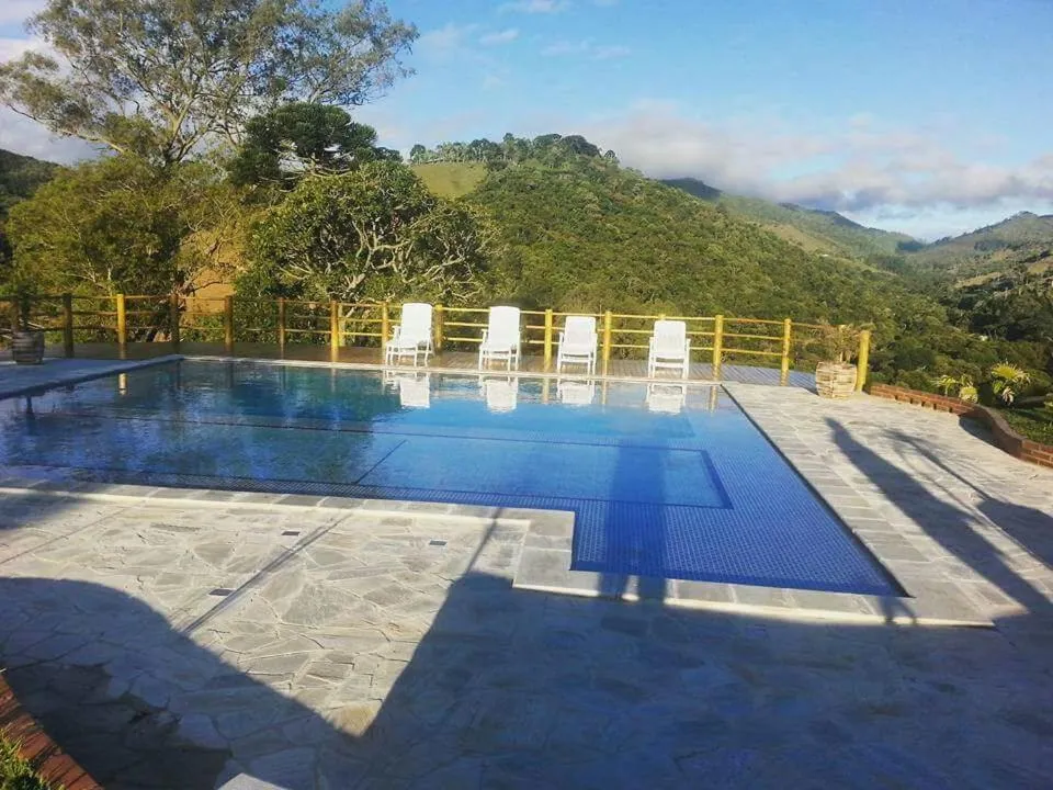 Swimming pool in Pousada Antigo Caminho Do Ouro