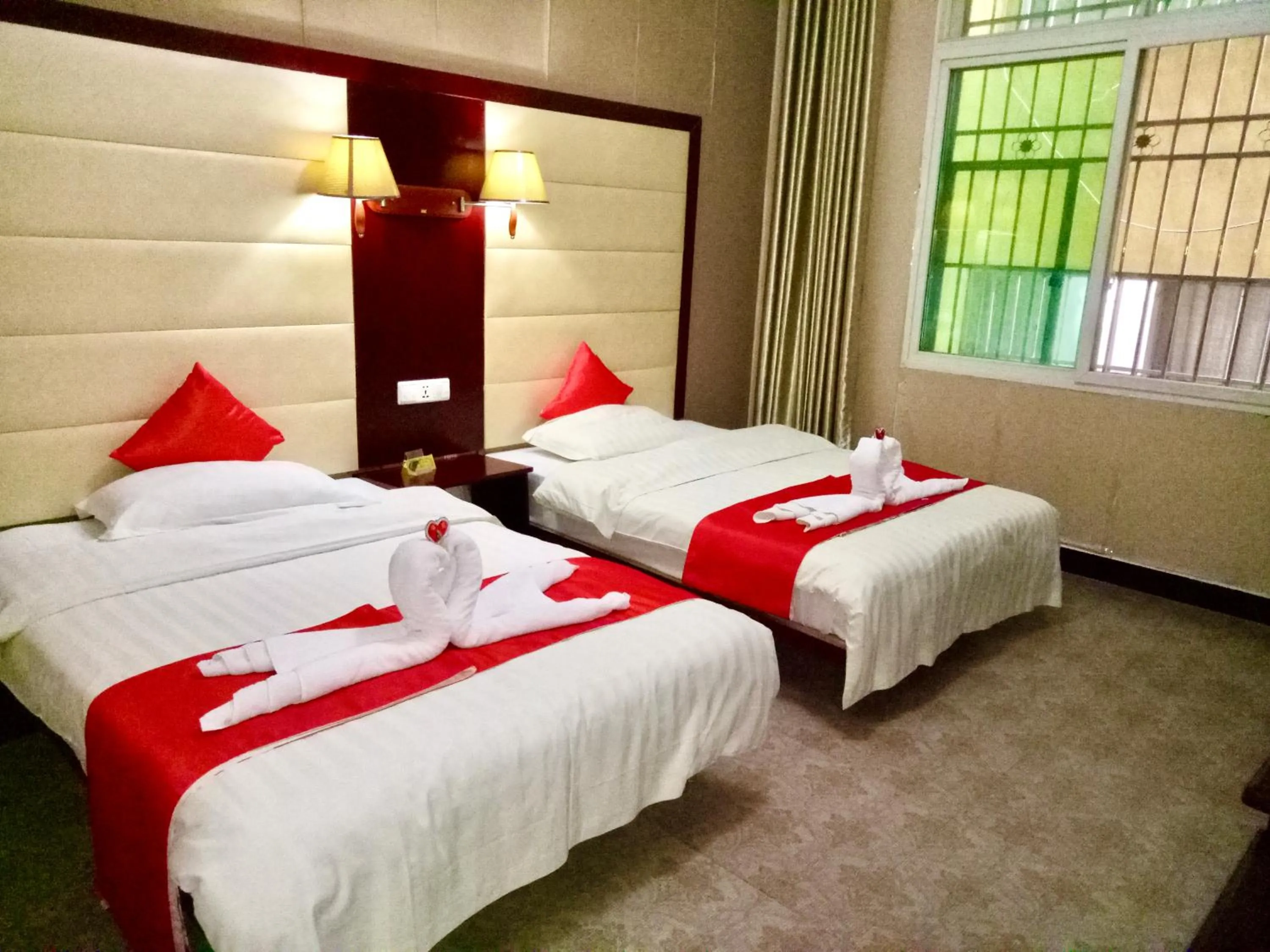 bunk bed, Bed in XiShuangBanNa International Aerial Garden South of Mekong River Business Hotel 傣江南商务酒店