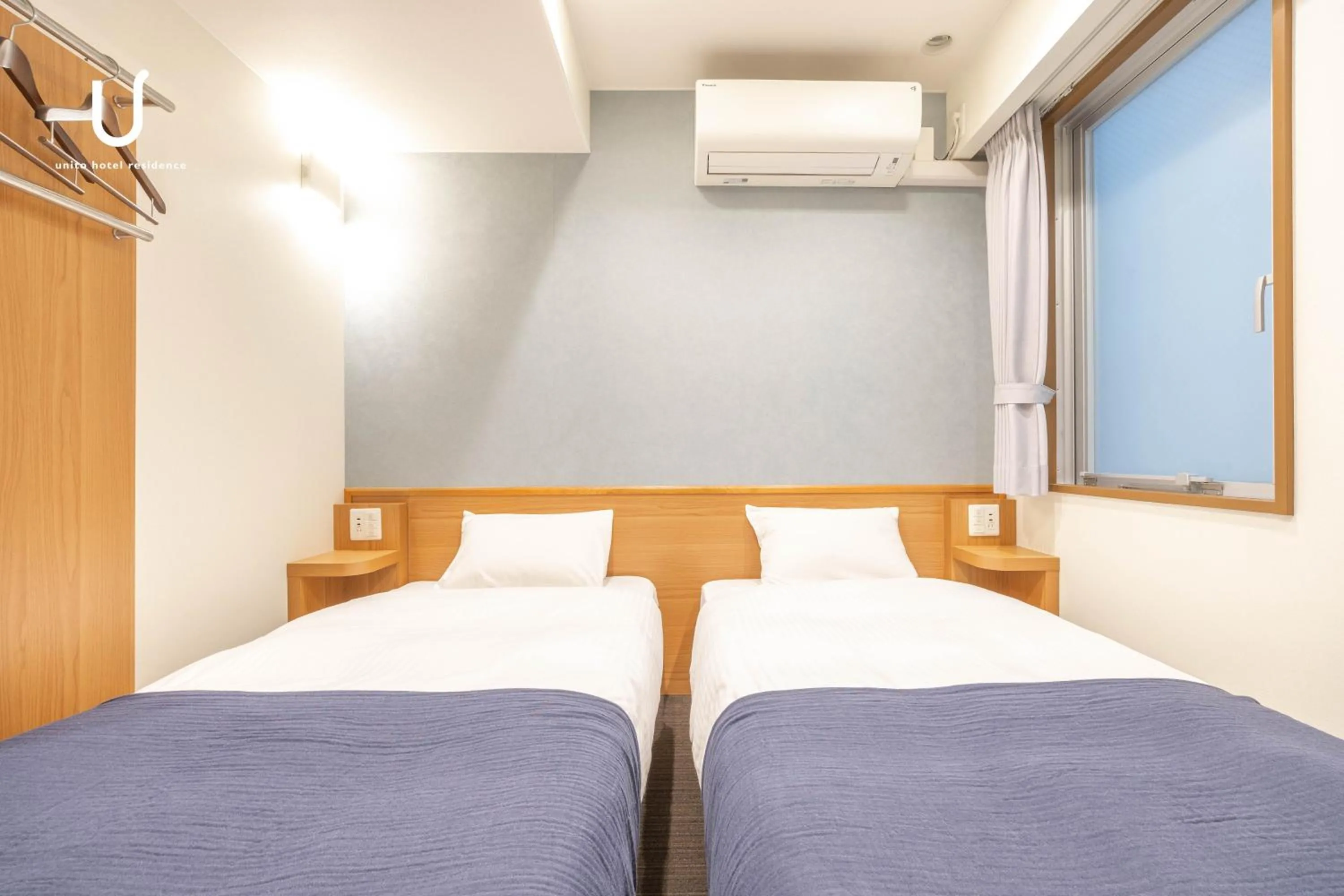 Bed in unito hotel residence Kyoto Station North