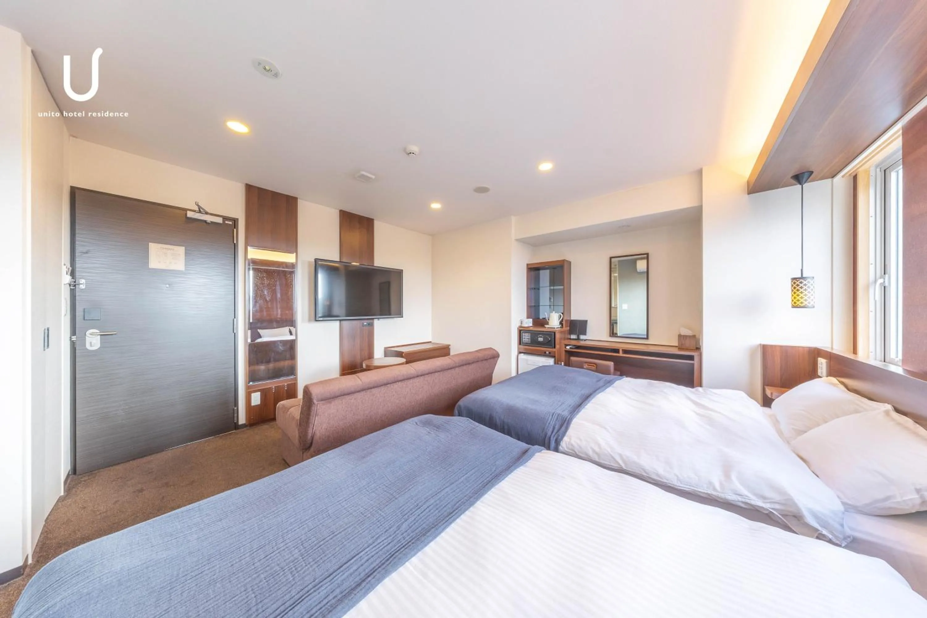 Bed in unito hotel residence Kyoto Station North