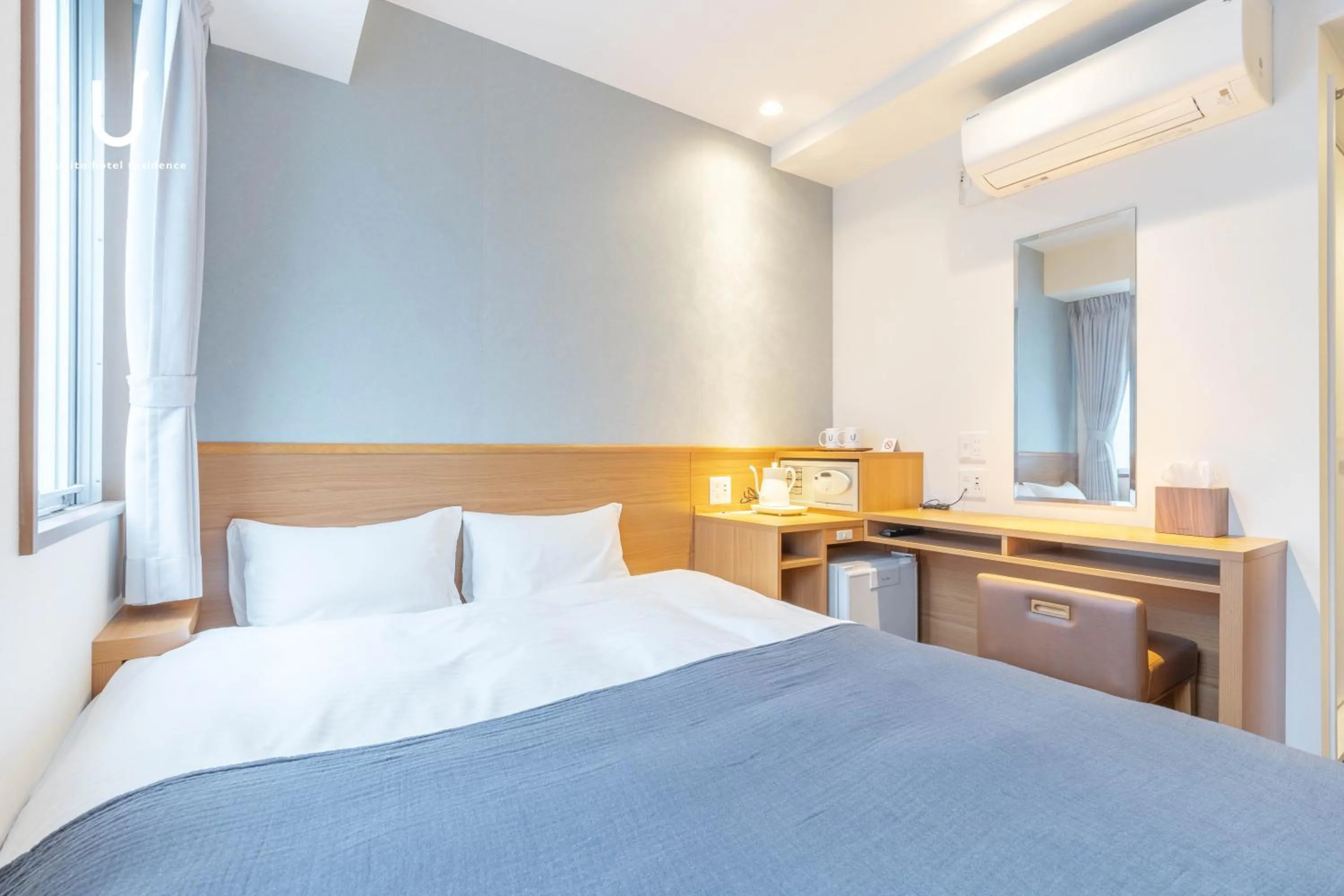 Bed in unito hotel residence Kyoto Station North