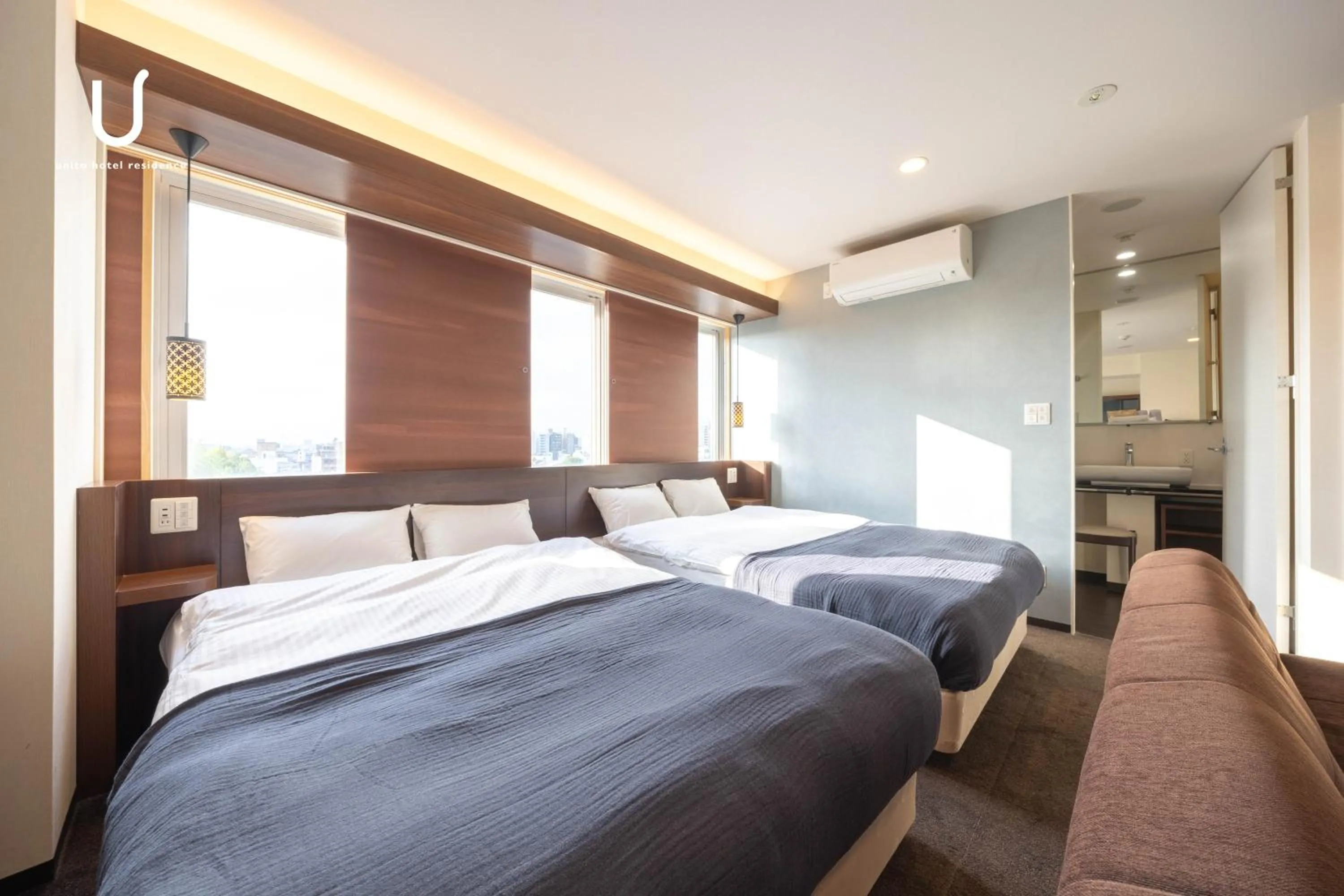 Bed in unito hotel residence Kyoto Station North