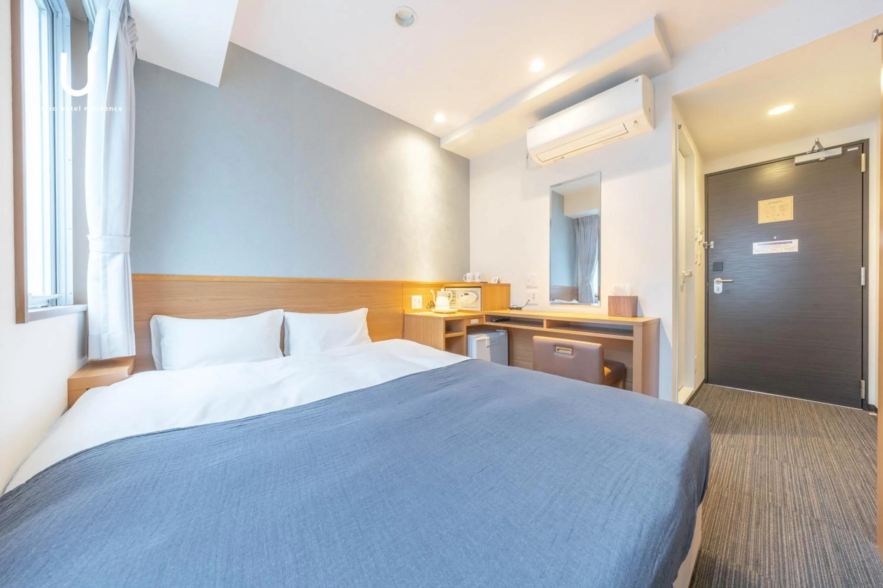 Bed in unito hotel residence Kyoto Station North